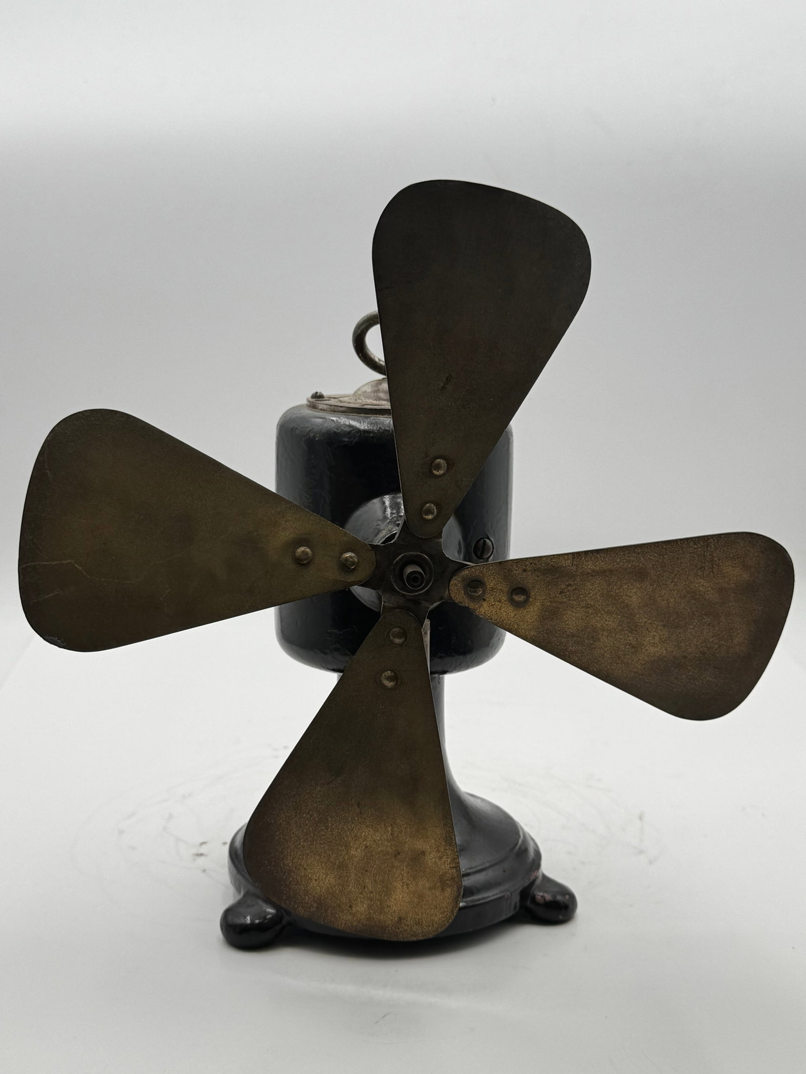 Ironclad Paragon style K&D electric fan: Rare antique K&D electric desk fan featuring four large brass blades, black cast iron housing, and an early open motor design with exposed lubrication ports and original rear adjustment plate.The