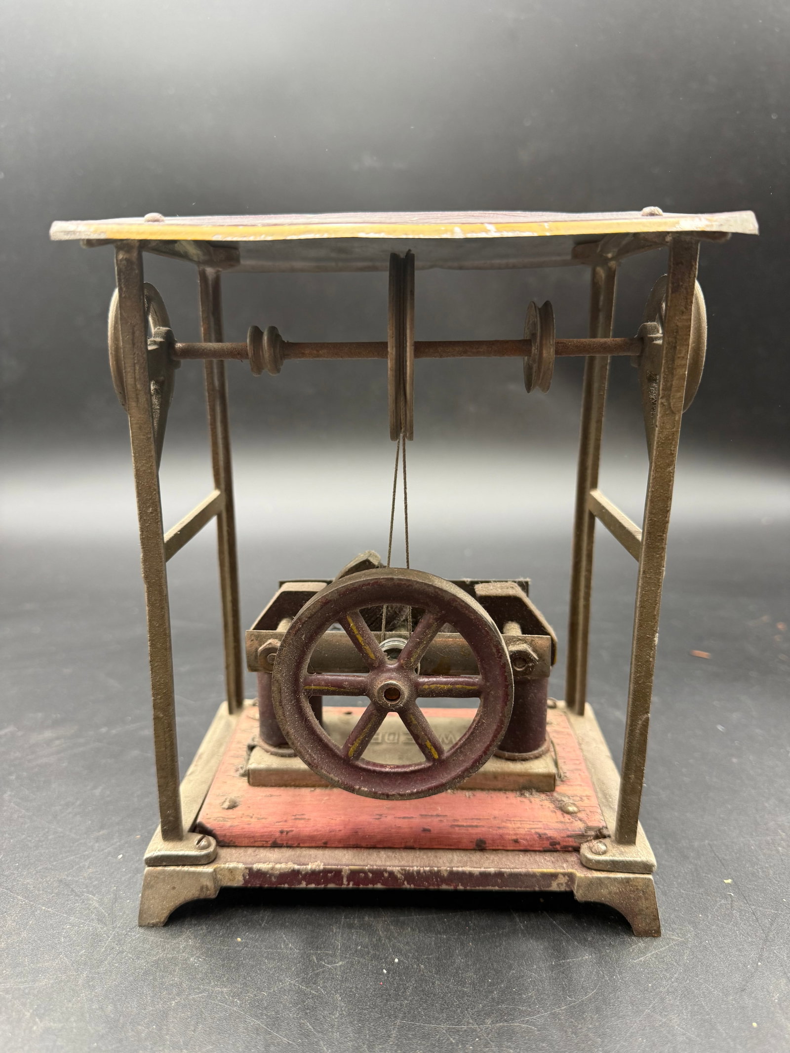 Antique Weeden No.109 motor: Weeden No.109 motor was introduced in 1912 and produced until 1918, it is a reversible motor. Base is 4" X 6", it stands 8" high. It features a roof and a five pulley shaft to drive accessories.