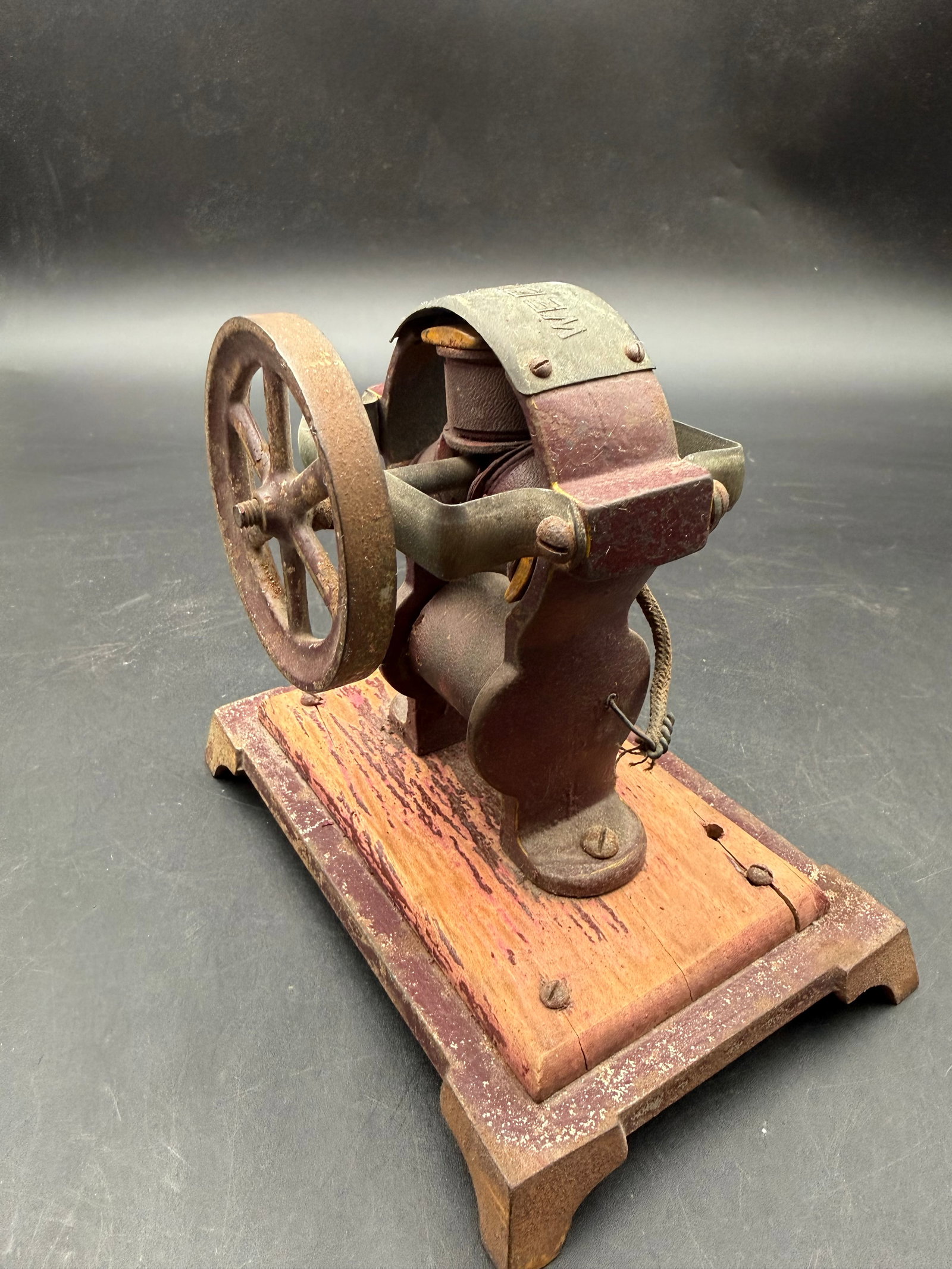 Antique Weeden No. 103 Motor Wood Base: The weeden No. 103 was introduced in 1913, production continued into 1918. 6" X 4" base with 2 1/2" flywheel. Early models were mounted on a wooden sub-base attached to a cast iron base, later models