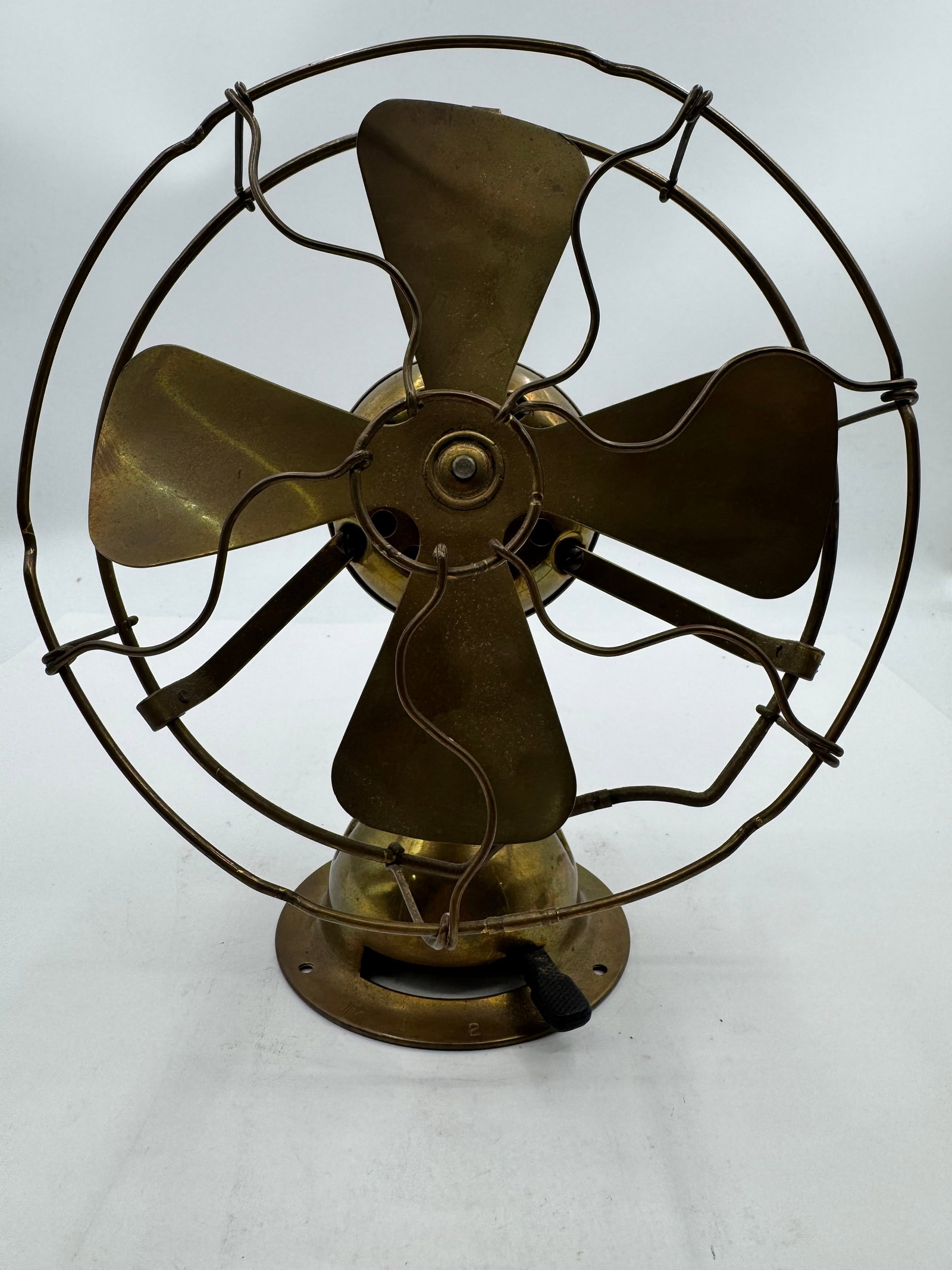 Antique Emerson Trojan 8” All Brass Blade Electric Desk Fan Type 53644: Antique “Trojan” 8” All Brass electric desk fan by The Emerson Electric Manufacturing Company of New York and St. Louis. Features four brass blades, ornate brass wire cage, and matching 