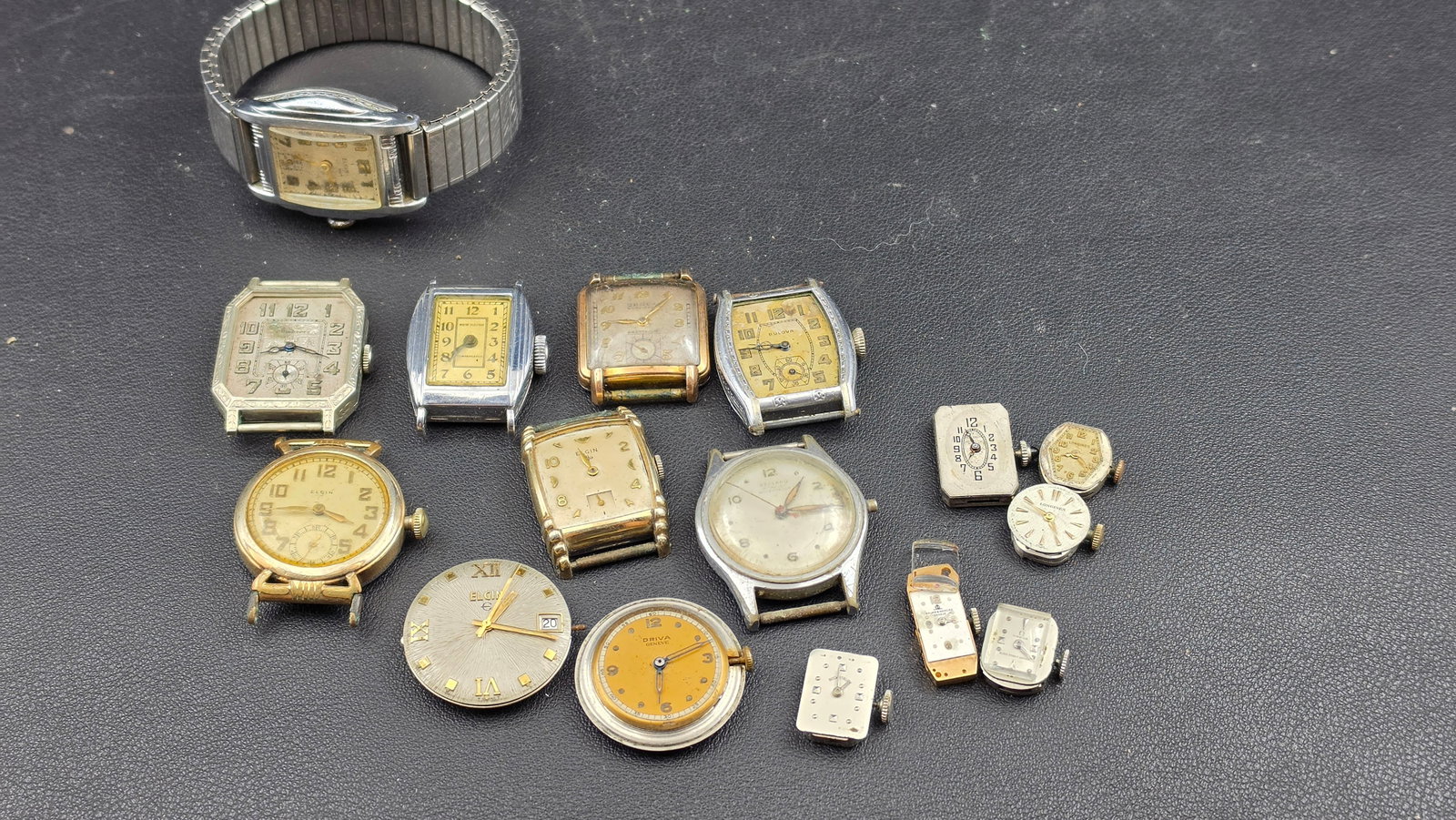 Vintage Watch Lot 20+ Pieces — Elgin, Longines, Omega, Baume & Mercier, Bulova & More c.: This is one of the strongest quality lots in the collection, consisting primarily of American Art Deco and Swiss mechanical watches from the 1920s through the 1960s, with most pieces running at time o