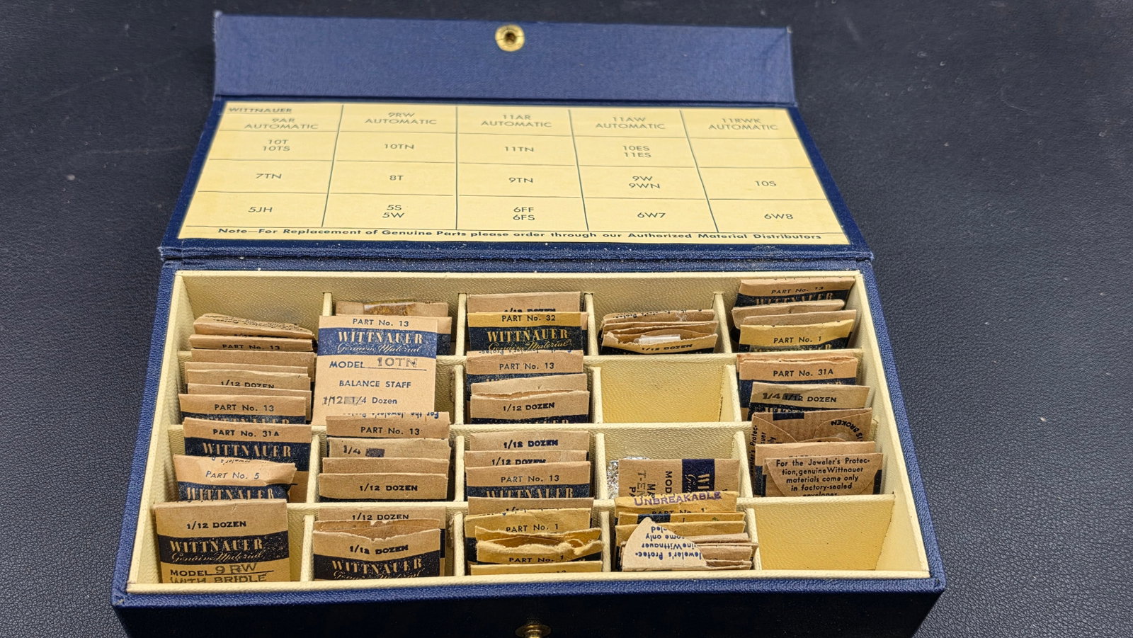 Wittnauer Genuine Assortment — Factory NOS Mainspring, Balance Staff & Winding Stem Dealer Kit c. (1 of 4)
