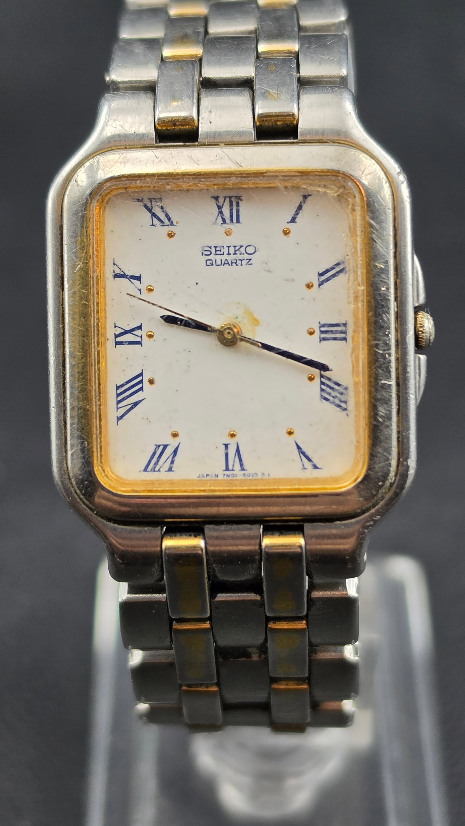 Vintage Seiko Quartz Ref 7N01-5009 Panther Style Two-Tone Roman Numeral Dress Watch 1980s: This is a vintage Seiko Quartz dress watch in the Panther-style square cushion case measuring approximately 27mm across, referencing caliber 7N01-5009 as stamped on the case back along with serial num