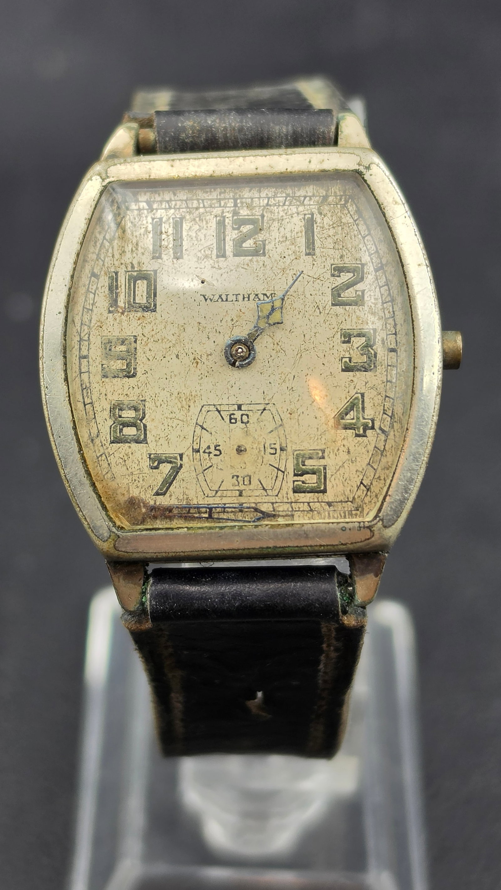 Antique Waltham A.W.W Co. USA Manual Wind Wristwatch c.1920s Silver-Tone Tonneau Case Illinois Tivol: This is a handsome early American wristwatch from the transitional era when pocket watch manufacturers were adapting their movements to wrist cases. The movement is signed A.W.W Co. Waltham U.S.A., se