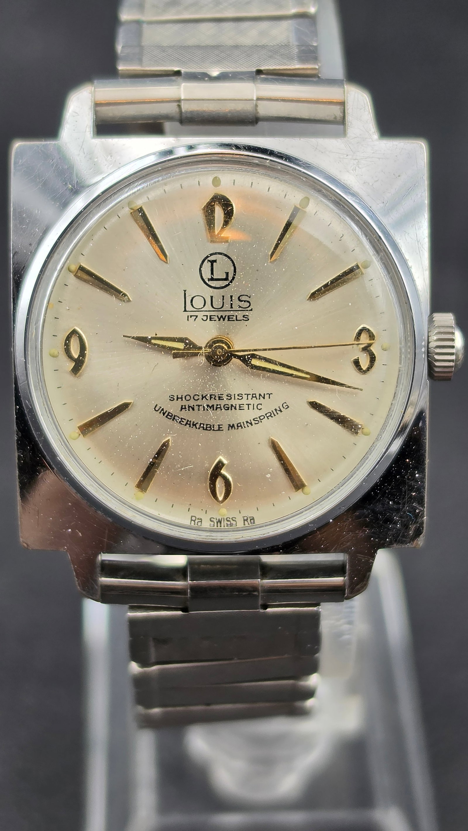Louis Swiss 17 Jewels Manual Wind Men's Watch c.1960s Silver-Tone Cushion Case 31mm Original Bracele: Louis was a Swiss-made import brand that supplied the mid-century American market through the 1950s and 1960s, offering quality Swiss lever movements in well-styled cases at accessible price points. T