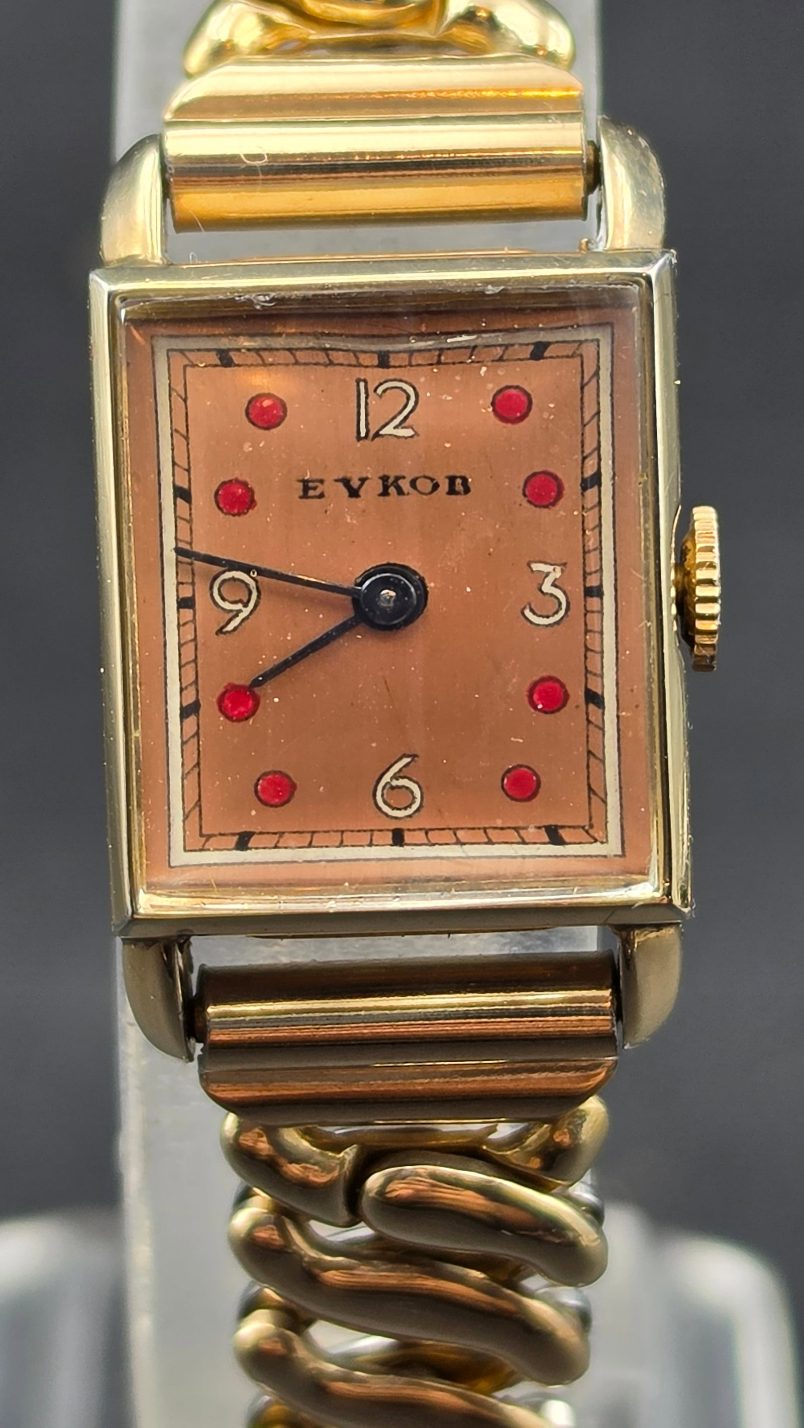 Circa 1945 Eykob Ladies Swiss 7-Jewel Manual Wind Art Deco Dress Watch Rose Dial Red Dots 17mm Runs: Up for sale is a charming vintage Eykob ladies' dress wristwatch dating to approximately the mid-1940s, powered by a Swiss 7-jewel manual-wind movement engraved "Eykob Watch Co. / Seven 7 Jewels / Una