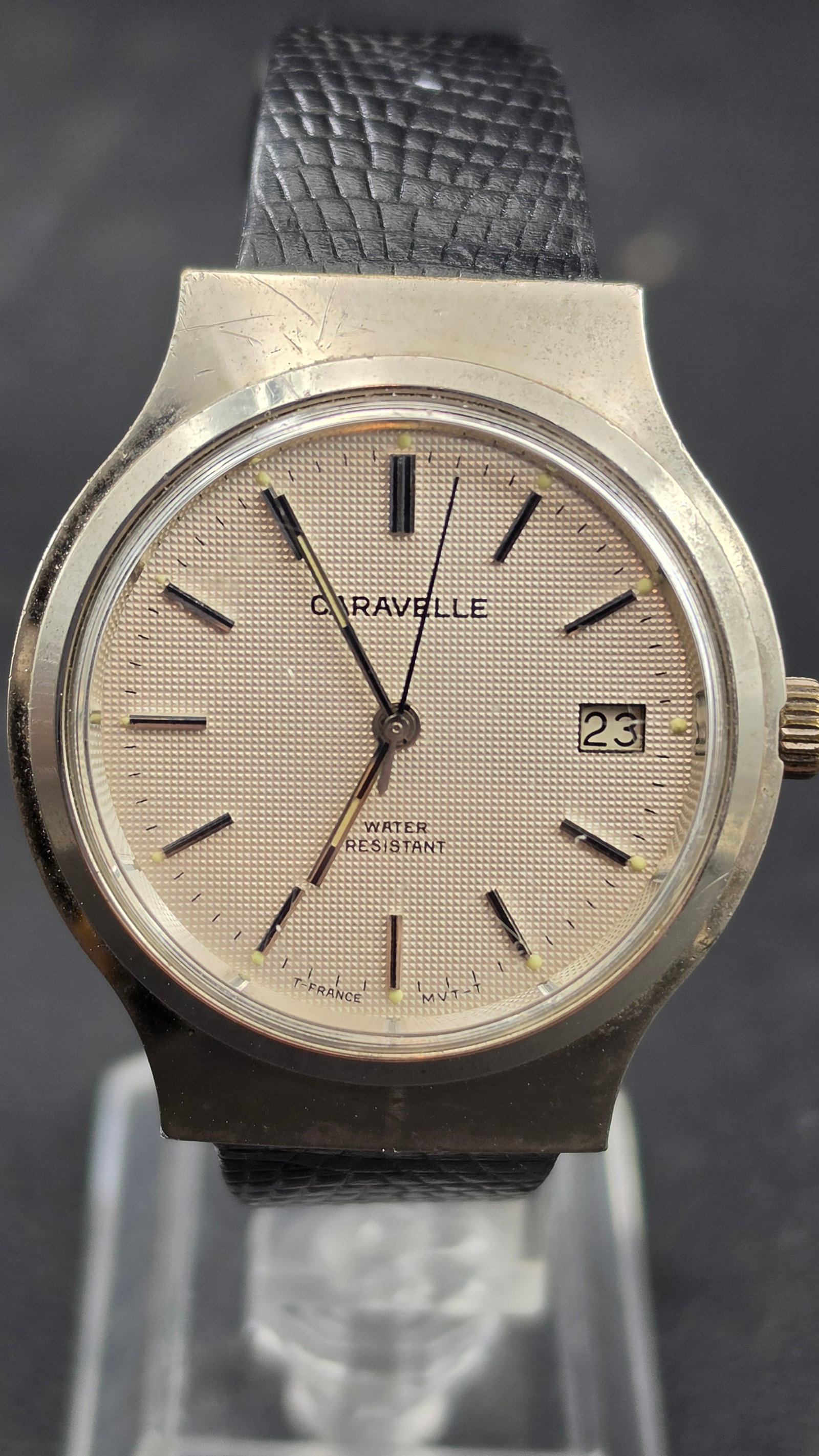 1979 Caravelle by Bulova Men's Quartz Date Watch N9 Base Metal Bezel 30mm Runs: Up for sale is a 1979 Caravelle by Bulova men's quartz wristwatch, definitively dated by the "N9" Bulova date code stamped on the case back. Caravelle was Bulova's Swiss-made value line introduced in 