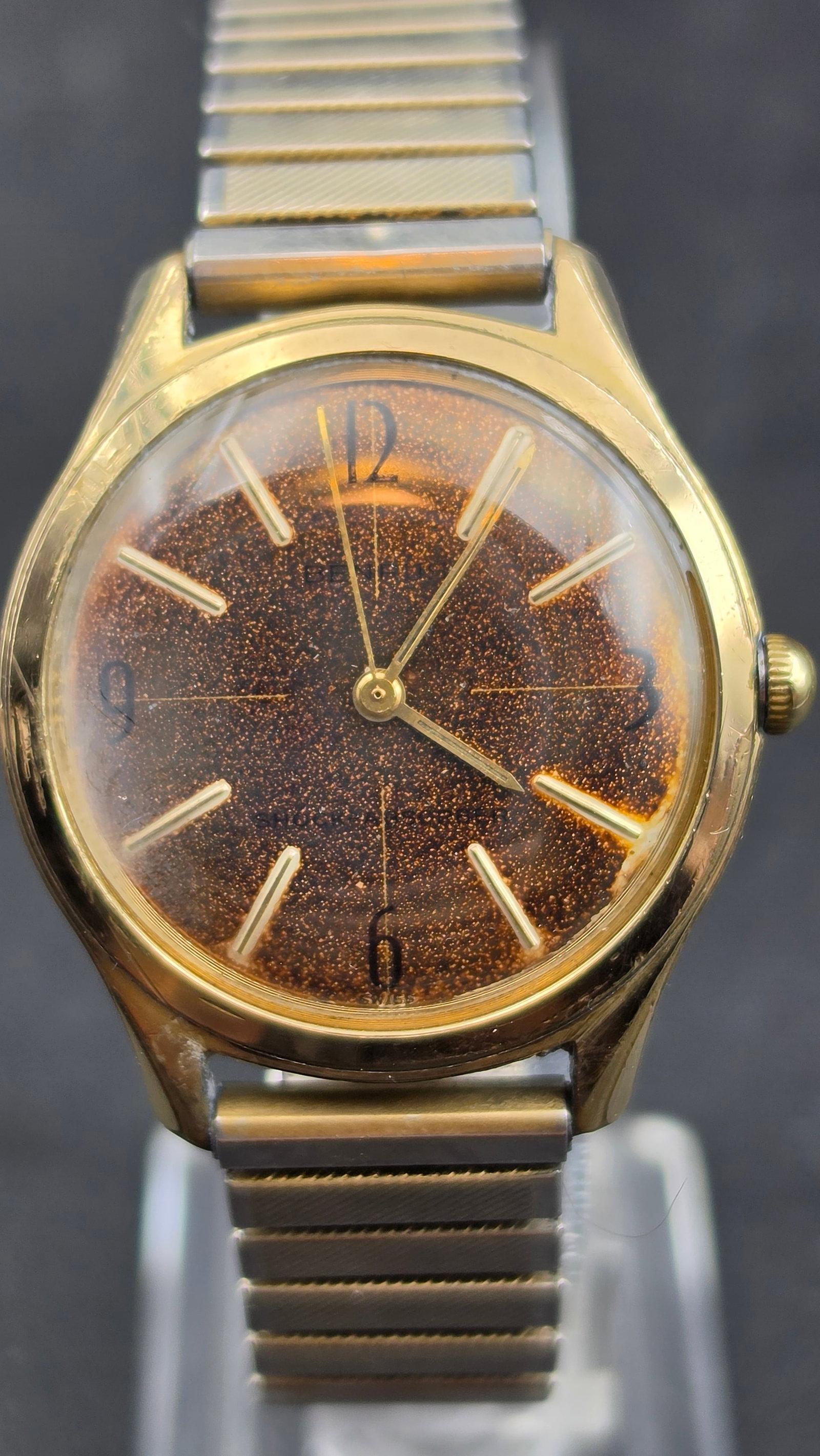 Vintage 1950s Benrus Series 2155 Goldstone Aventurine Glitter Dial Manual Wind Swiss Men's Watch: Up for sale is a genuine vintage Benrus men's wristwatch dating to the 1950s, referencing Series #2155 as stamped on the case back. This example stands out for its striking brown goldstone aventurine-
