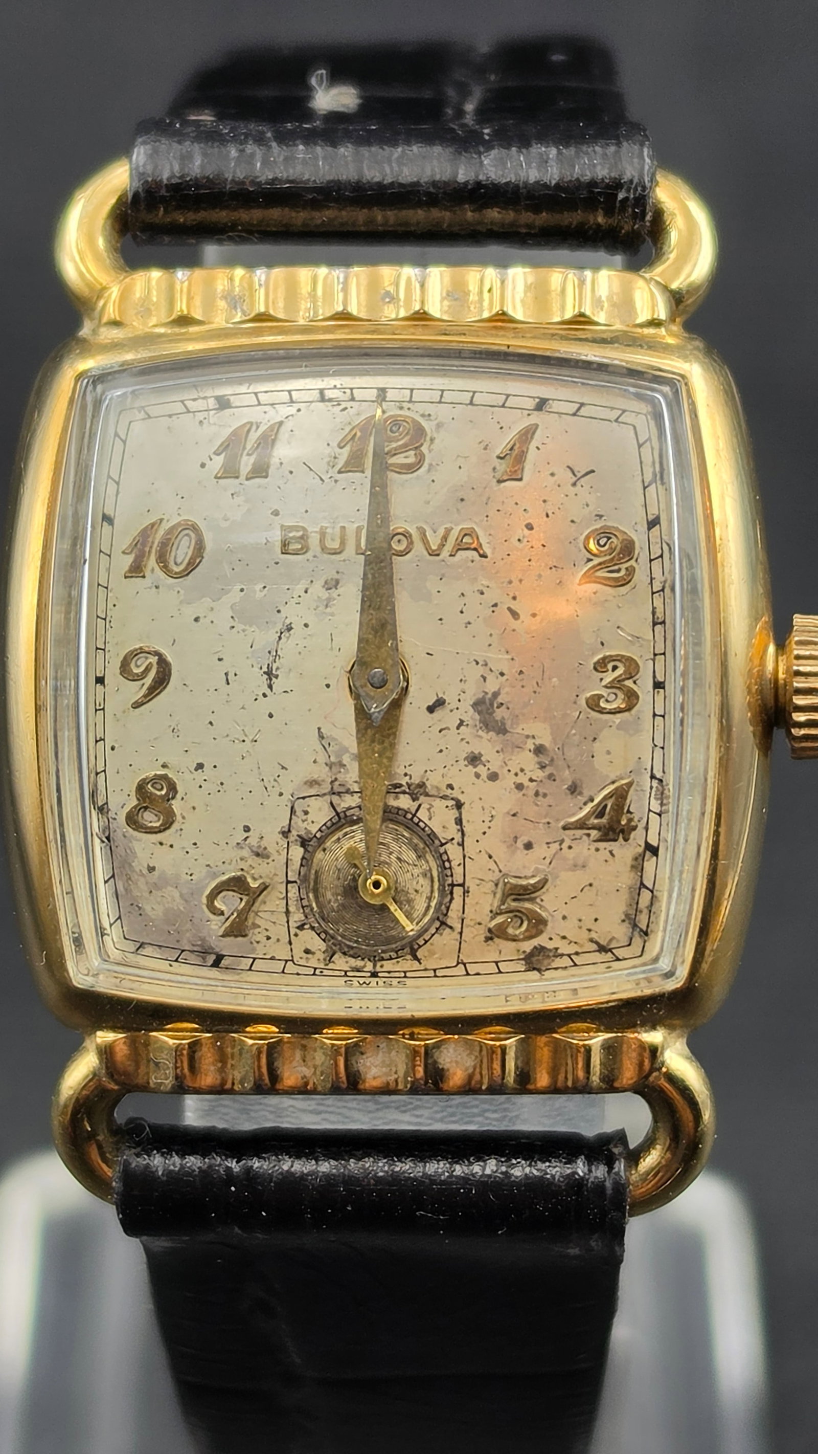 Vintage 1950 Bulova Cal 10BC 15 Jewel Cushion Case Gold Plate Manual Wind Swiss Men's Watch: Up for sale is a vintage Bulova men's cushion-case wristwatch dating to 1950, identified by the date code "L0" stamped on the case back per Bulova's documented coding system. The movement is the Swiss