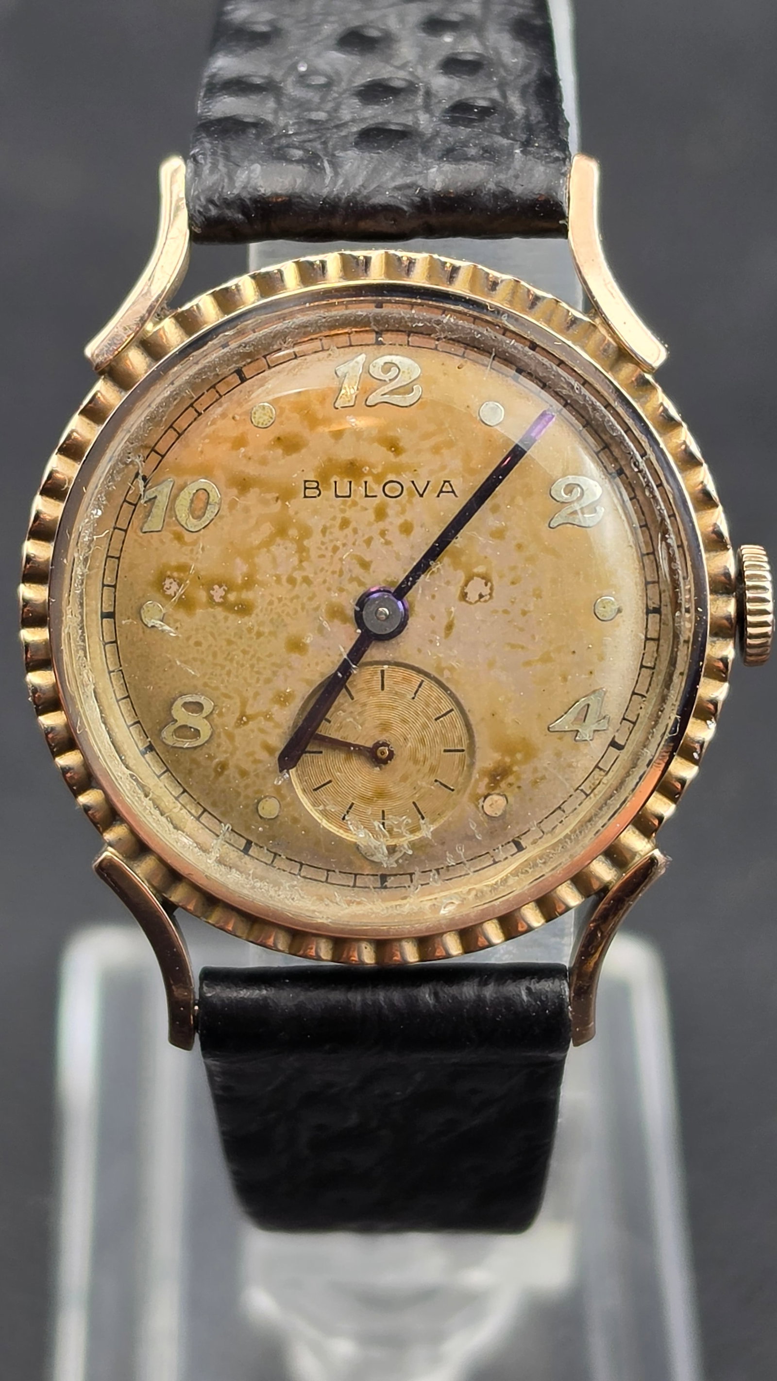 Vintage 1940s Bulova 21 Jewel Cal 10AK 14K Rose Gold Filled Fluted Bezel Men's Watch Runs: Up for sale is a vintage 1940s Bulova men's manual-wind wristwatch powered by the American-made Bulova Watch Co. U.S.A. caliber 10AK, 21 jewels. The case back is stamped 14K Gold Filled Bulova with ca