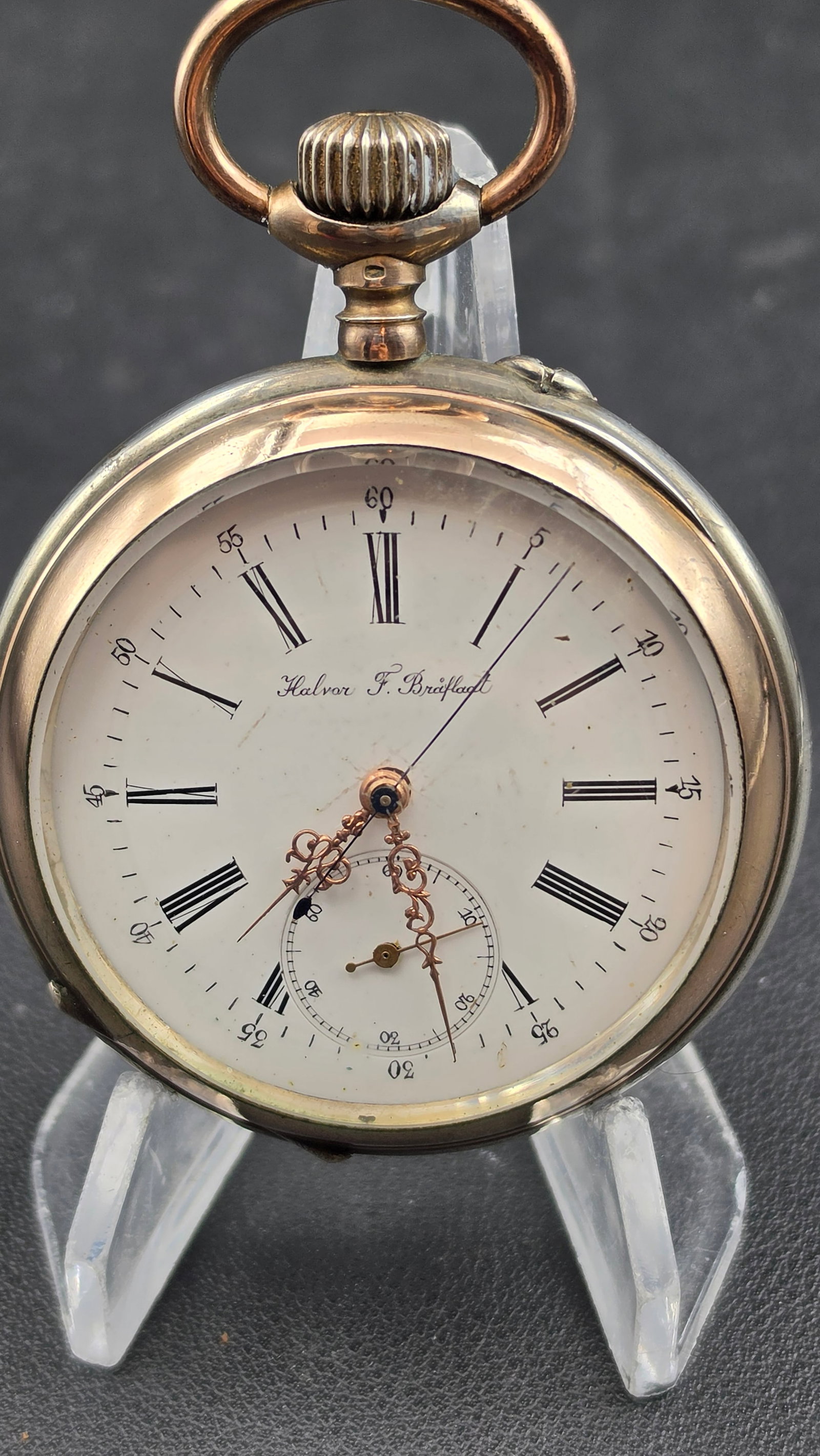 Antique c.1890s Swiss Silver .800 Pocket Watch Signed Halvor F. Braflaat Norwegian Retailer 15 Rubis: Up for auction is a rare and charming antique Swiss pocket watch retailed by Halvor F. Braflaat — a Norwegian watchmaker or retailer whose name appears in flowing script on the white enamel dial, ma