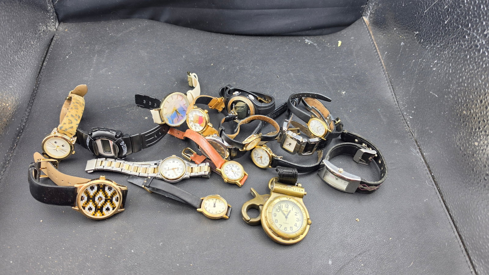 Lot of 15+ Fashion Novelty Quartz Watches c.1990s-2000s Timex Lorus Winnie the Pooh Cat Pocket-Lite: This is a fun and varied lot of ladies fashion and novelty quartz watches from the 1990s through 2000s, offering a broad range of styles and themes well suited for resale, gifting, costume accessory u