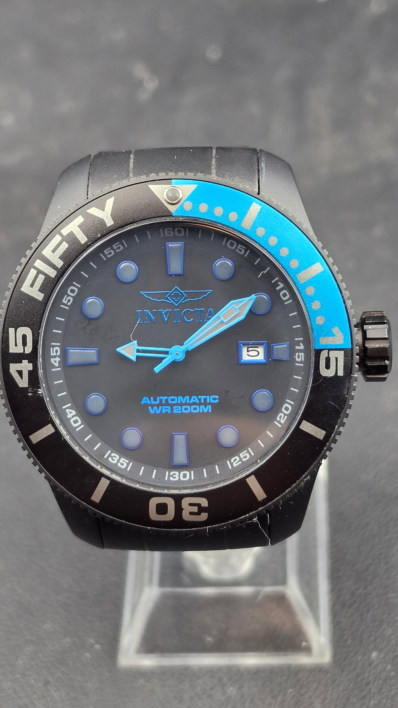 Invicta TI-22 Professional Diver Model 20517 NH35A Automatic Titanium Black Blue 50mm 2015: This is an Invicta TI-22 Professional Diver, model number 20517, from Invicta's titanium Reserve-level line. The watch is powered by a Seiko NH35A 24-jewel Japanese automatic movement, visible through