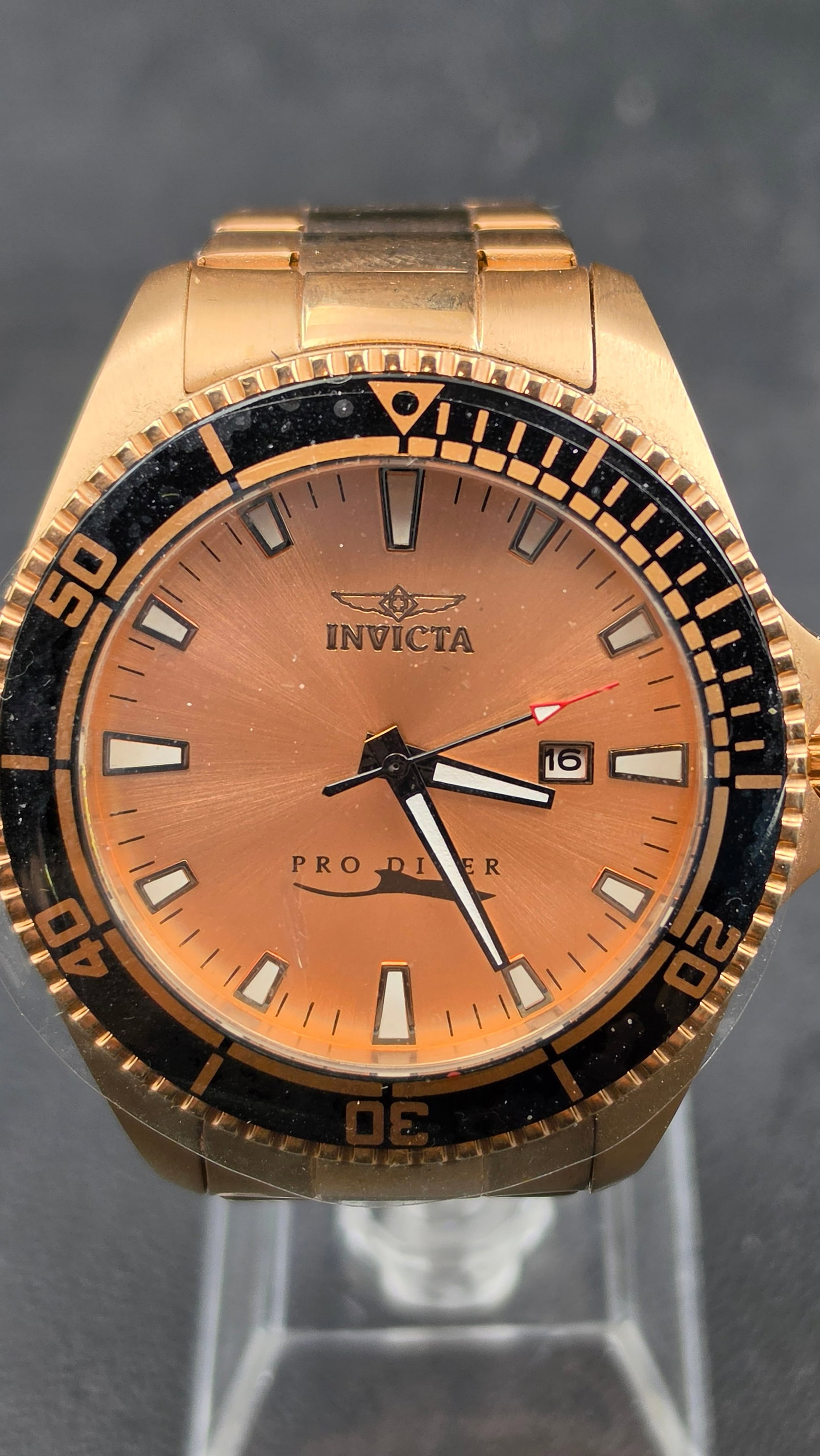 Invicta Pro Diver Master of the Oceans Tritnite 45mm Model 15185 Rose Gold Dial Japan Men's Watch 20: Up for sale is an Invicta Pro Diver "Master of the Oceans" Tritnite Night Glow, Model No. 15185, in a full rose gold-tone PVD stainless steel case — a sharp-looking monochromatic variant that pairs 