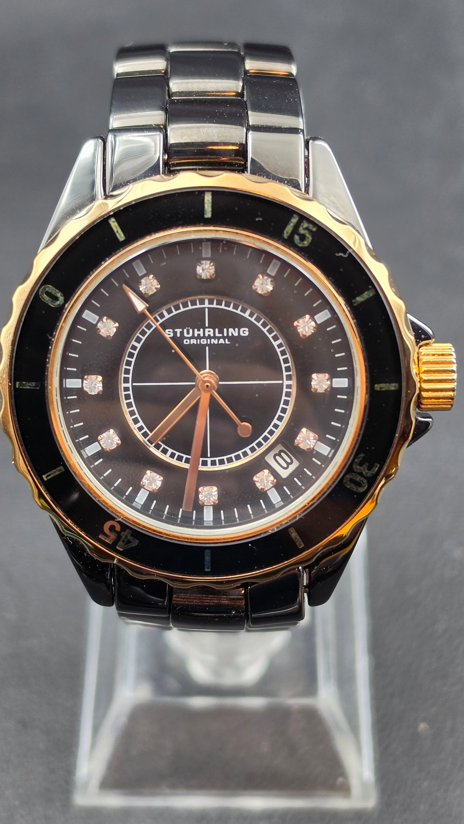 Stührling Original Black Ceramic & Gold-Tone Diver-Style Quartz Watch w/ Crystal Indices ~2010s: This is a sharp-looking Stührling Original diver-style quartz watch featuring a genuine ceramic case and bracelet with gold-tone accents throughout — a combination the brand marketed as a luxury-le