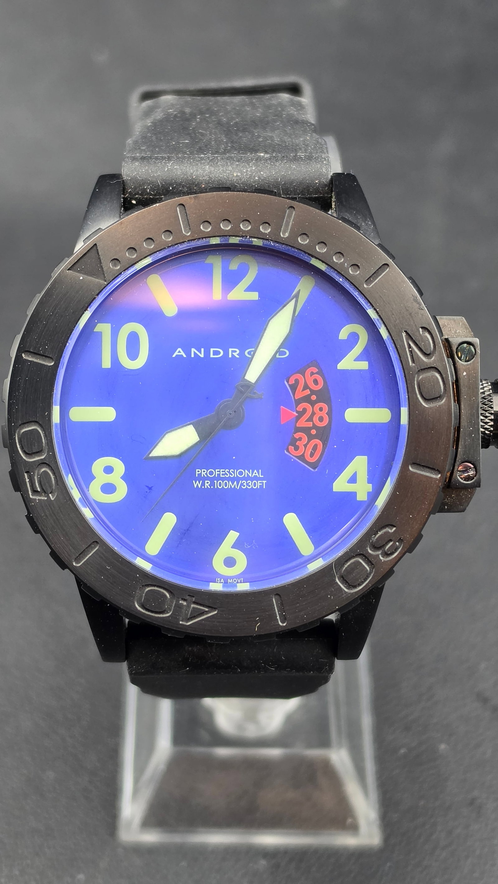 Android USA AD474 Professional Diver Blue Dial Date Quartz Watch Black PVD ISA Movement 48mm ~2010s: This is the Android USA AD474, a purpose-built professional diver from the brand's core lineup featuring a striking electric blue dial with oversized yellow-green lume numerals and matching lume hands