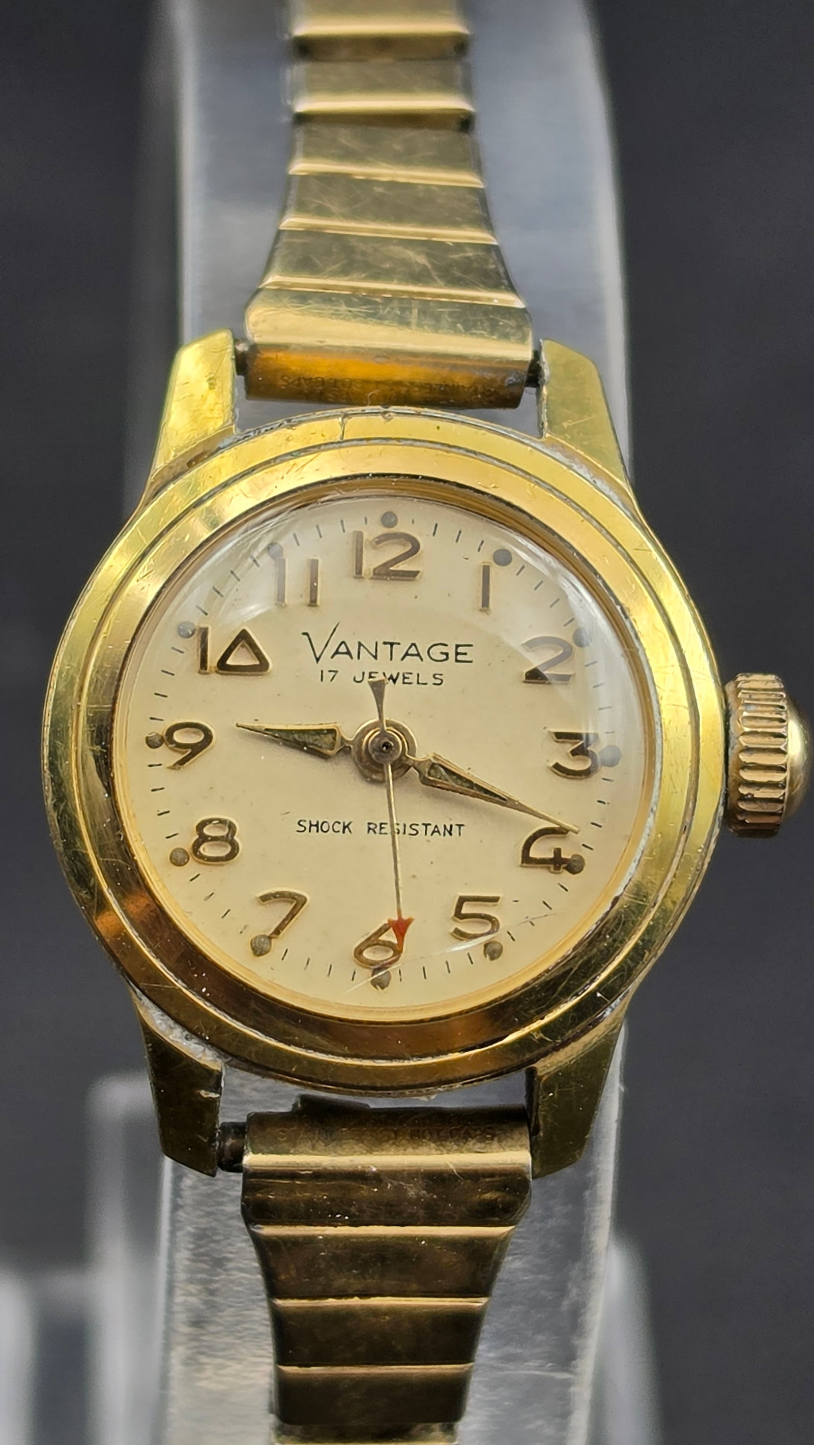 Vintage 1965 Vantage 17 Jewels Swiss Made Base Metal Bezel Steel Back Ladies Running Watch 21mm: Up for sale is a vintage ladies' Vantage manual-wind watch from 1965. The case back is stamped "Antimagnetic / Shock Resistant / Base Metal Bezel / Steel Back / Waterproof / Waterproof If Seals Remain