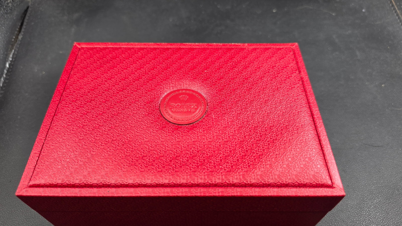 Vintage Rolex Geneve Red Watch Box Montres Rolex S.A. Geneve Suisse Reference 60.00.02 circa 1980s-1: This is a genuine Rolex presentation watch box in the classic all-red livery associated with Rolex's iconic packaging from the 1980s through the 1990s. The exterior features the signature embossed Rol
