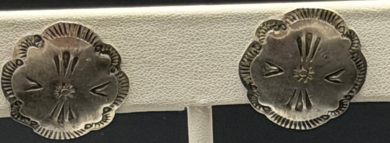 5g-Vintage RJ Sterling Silver Concho Stud Earrings: Vintage sterling silver stud earrings featuring traditional Southwestern concho styling with hand-stamped sunburst and scalloped details. Marked Sterling with maker’s mark RJ on the reverse. Classic