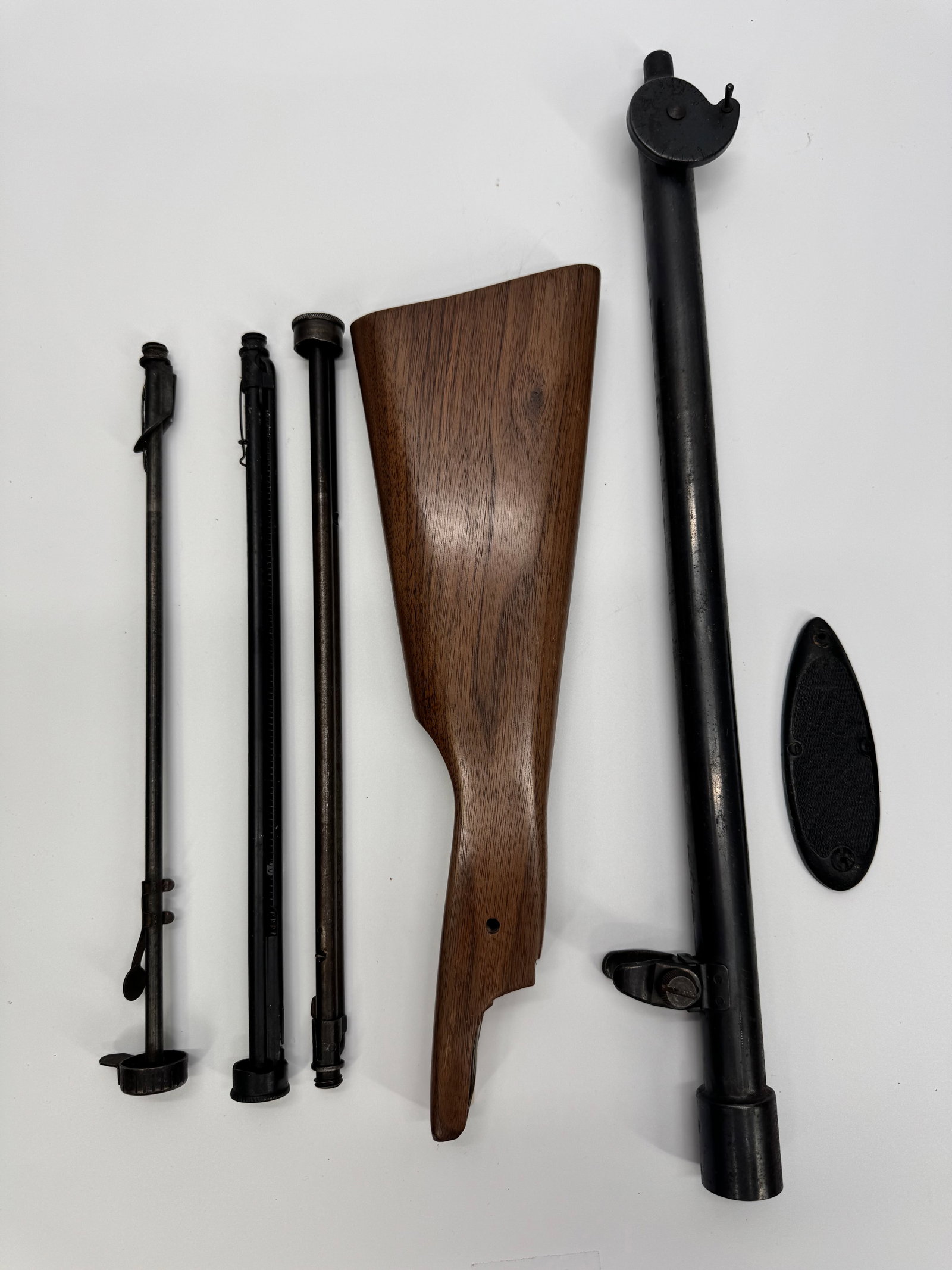 Daisy Double Barrel BB Gun Display Model: Vintage Daisy Double Barrel BB Gun display or custom-built replica featuring twin barrel tubes, hardwood stock, and black metal components. Included with the gun are removable barrel assemblies, buttp