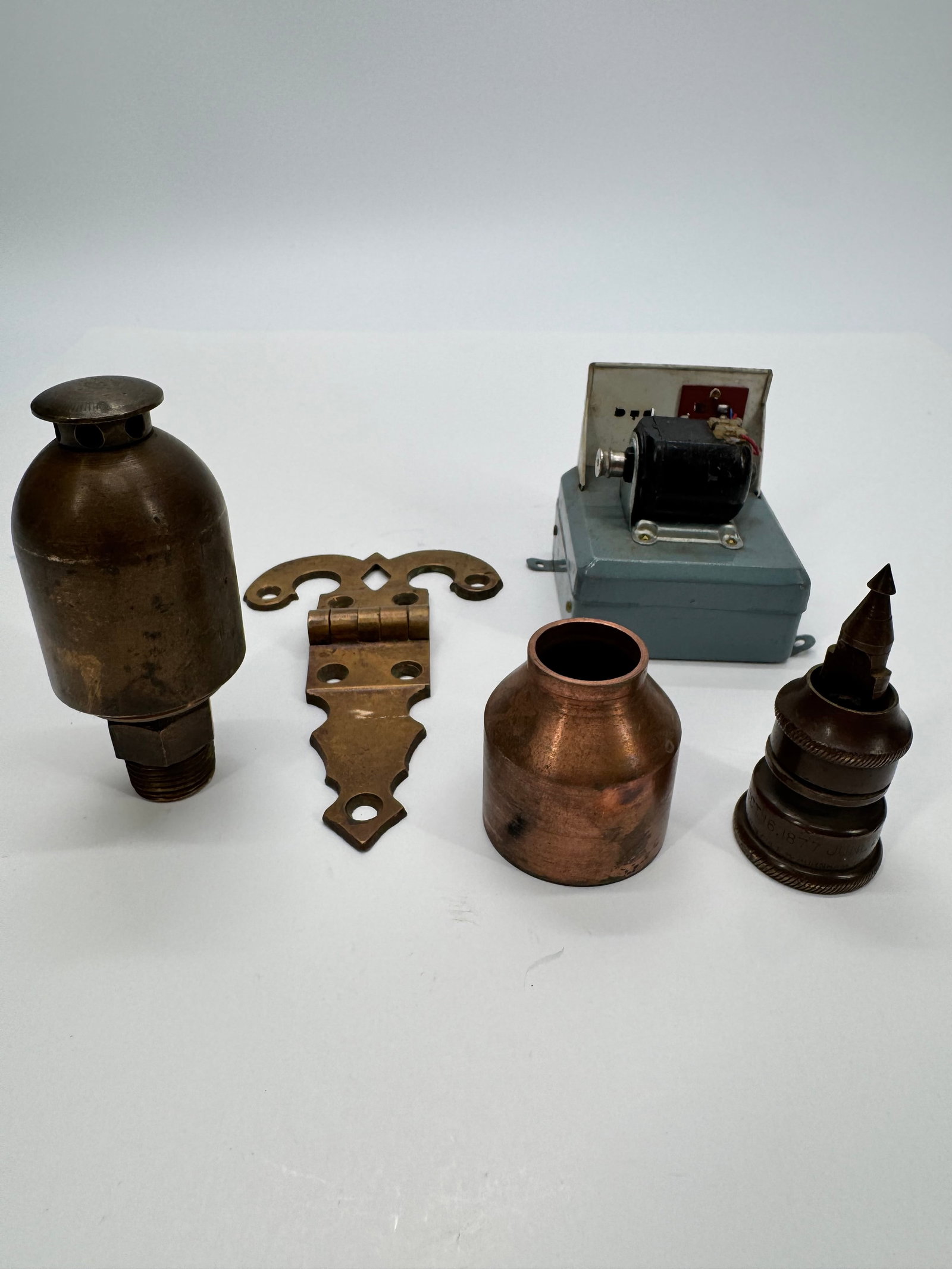 Antique Industrial & Electrical Parts Lot: Mixed lot of antique industrial, electrical, and hardware components dating from the late 19th to mid-20th century. Includes a brass float-style valve or vent assembly, decorative cast brass hinge har