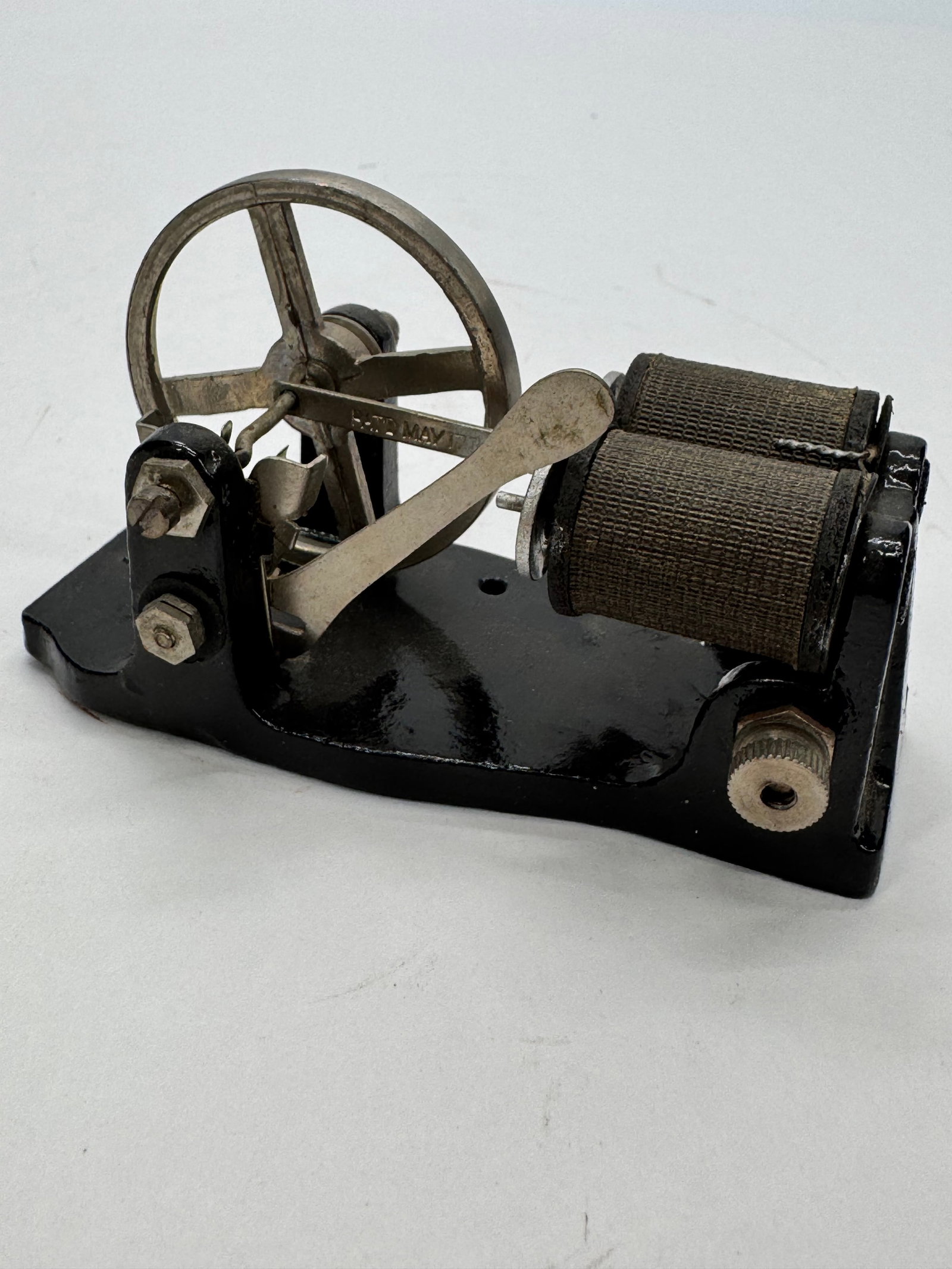 Antique Mesco Toy Electric Motor: Original antique Mesco toy electric motor dating to the early 1900s. Features a cast iron base with exposed armature, flywheel, and field coil, representing one of Mesco’s early educational and demo