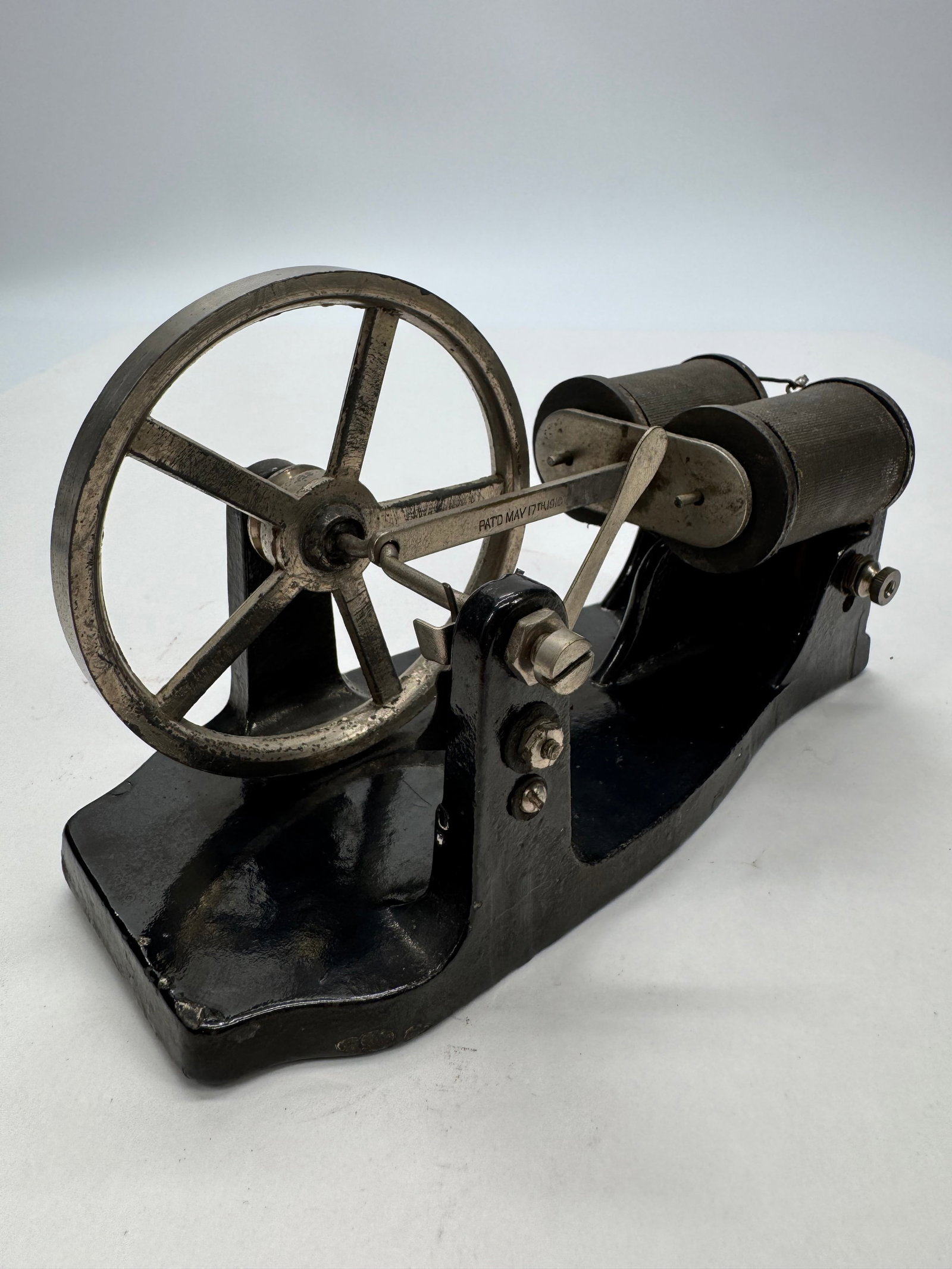 Antique Mesco Brand Toy Electric motors: Original antique Mesco toy electric motor dating to the early 1900s. Features a cast iron base with exposed armature, flywheel, and field coil, representing one of Mesco’s early educational and demo