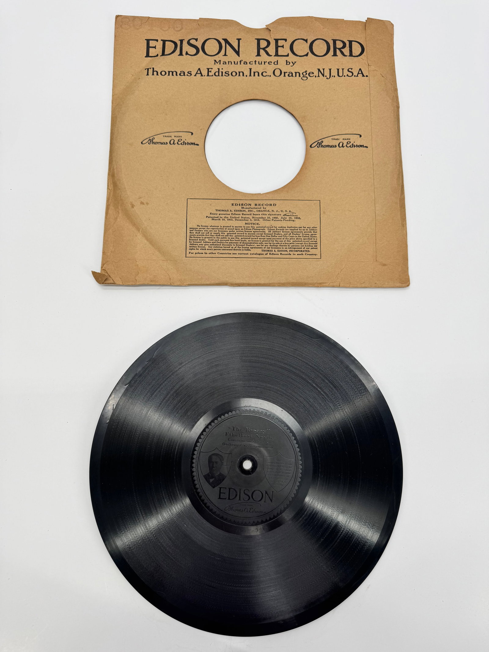 Antique Edison Diamond Disc Record “The Rosary” Ethelbert Nevin w/ Original Sleeve: Original Edison Diamond Disc Record featuring The Rosary by Ethelbert Nevin with contralto, chorus, and orchestra accompaniment. Includes the original Thomas A. Edison paper sleeve. Displays age-relat