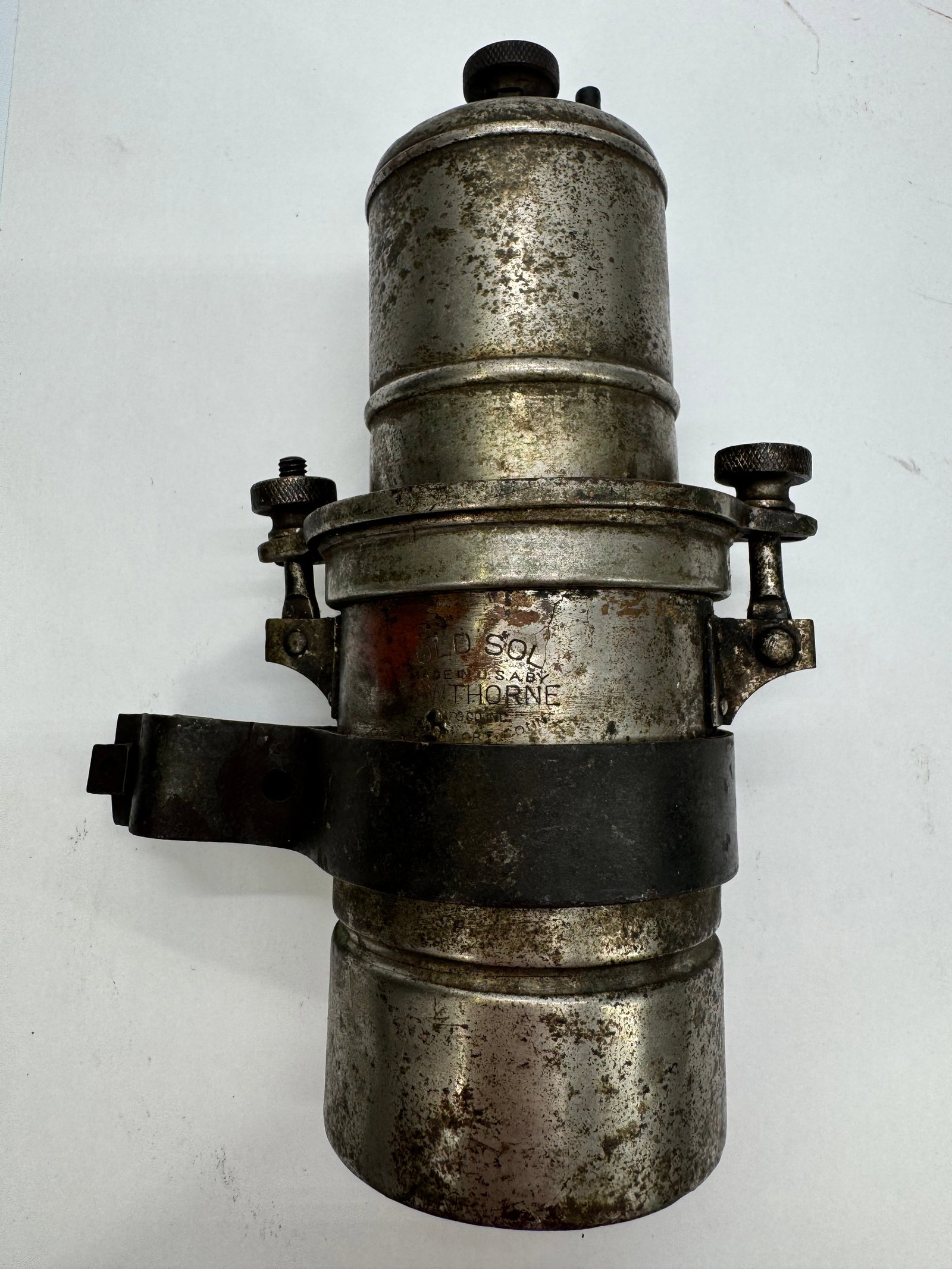 Antique Old Sol Hawthorne Carbide Bicycle Lamp Chicago IL Nickel Headlight: Antique Old Sol bicycle carbide lamp manufactured by Hawthorne Mfg. Co., Inc., Chicago, Illinois. Features original nickel finish, mounting bracket, and maker’s stamp. Used calcium carbide to genera