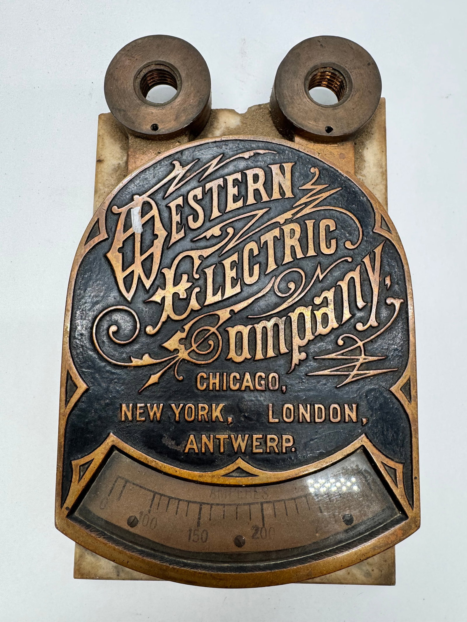 Antique Western Electric Co. Victorian Ammeter w/ Marble Base: Late 19th-century Western Electric Company ammeter featuring an ornate gilt face, curved glass window, and marble base. Marked Chicago, New York, London, and Antwerp. Scale to 200 amps. Untested and s