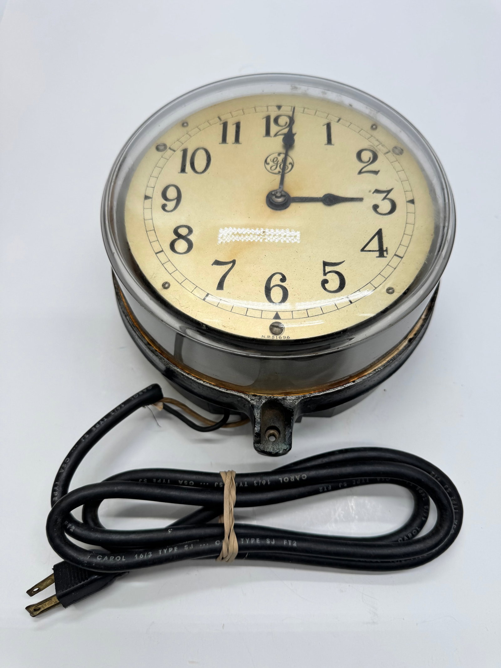 Vintage General Electric Type C-14 Industrial Electric Wall Clock GE USA: Vintage General Electric Type C-14 industrial wall clock with original GE dial and identification plate. Heavy metal case with glass crystal and mounting bracket. Operates on 115–120V, 60-cycle hous
