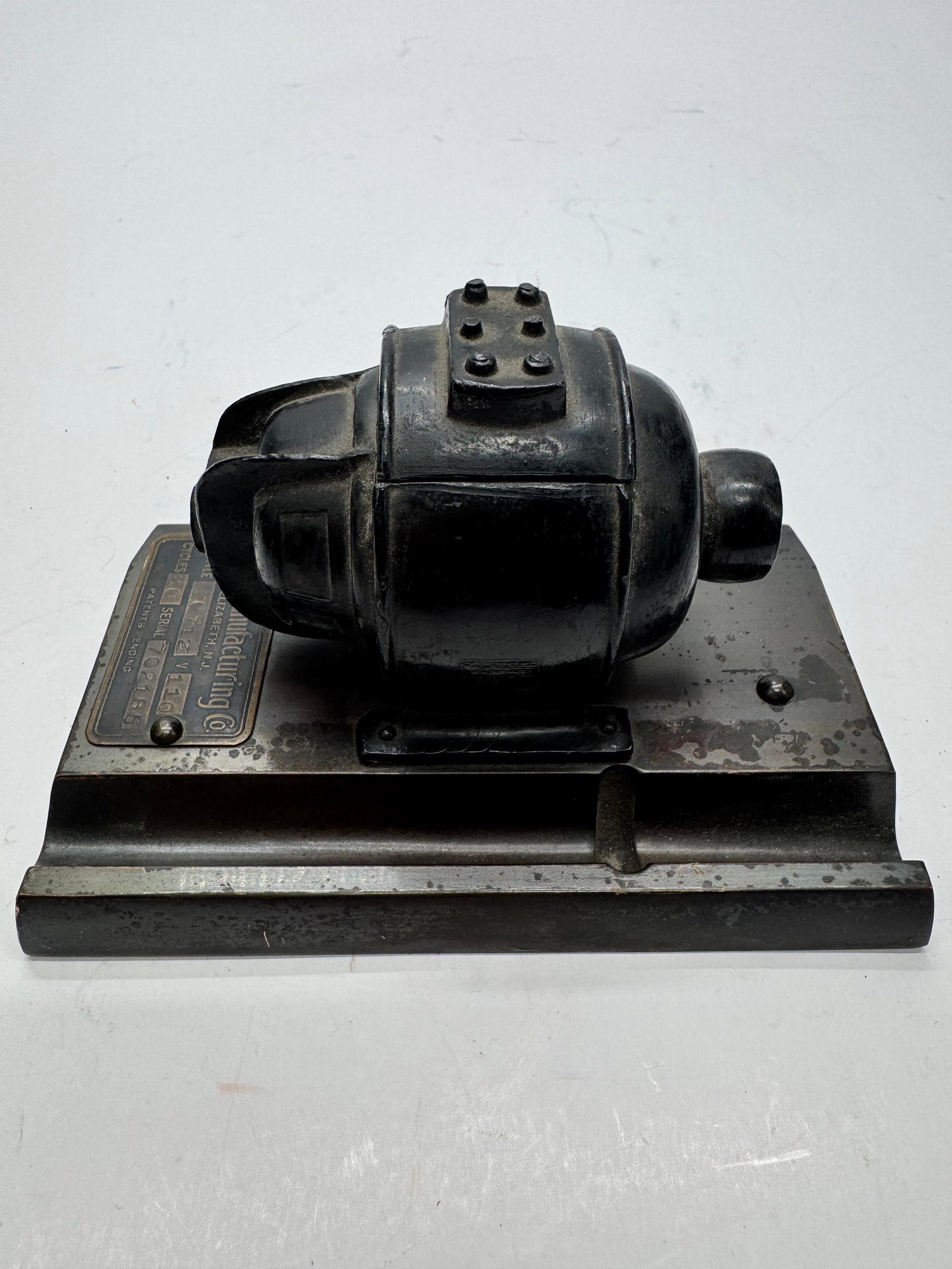 Vintage Diehl Manufacturing Co. Electric Motor Paperweight Salesman Sample: Vintage Diehl Manufacturing Co. miniature electric motor paperweight mounted on a metal base with original identification plate. Marked Elizabeth, N.J., Style 16712, 110 Volts, 60 Cycles. Attractive i