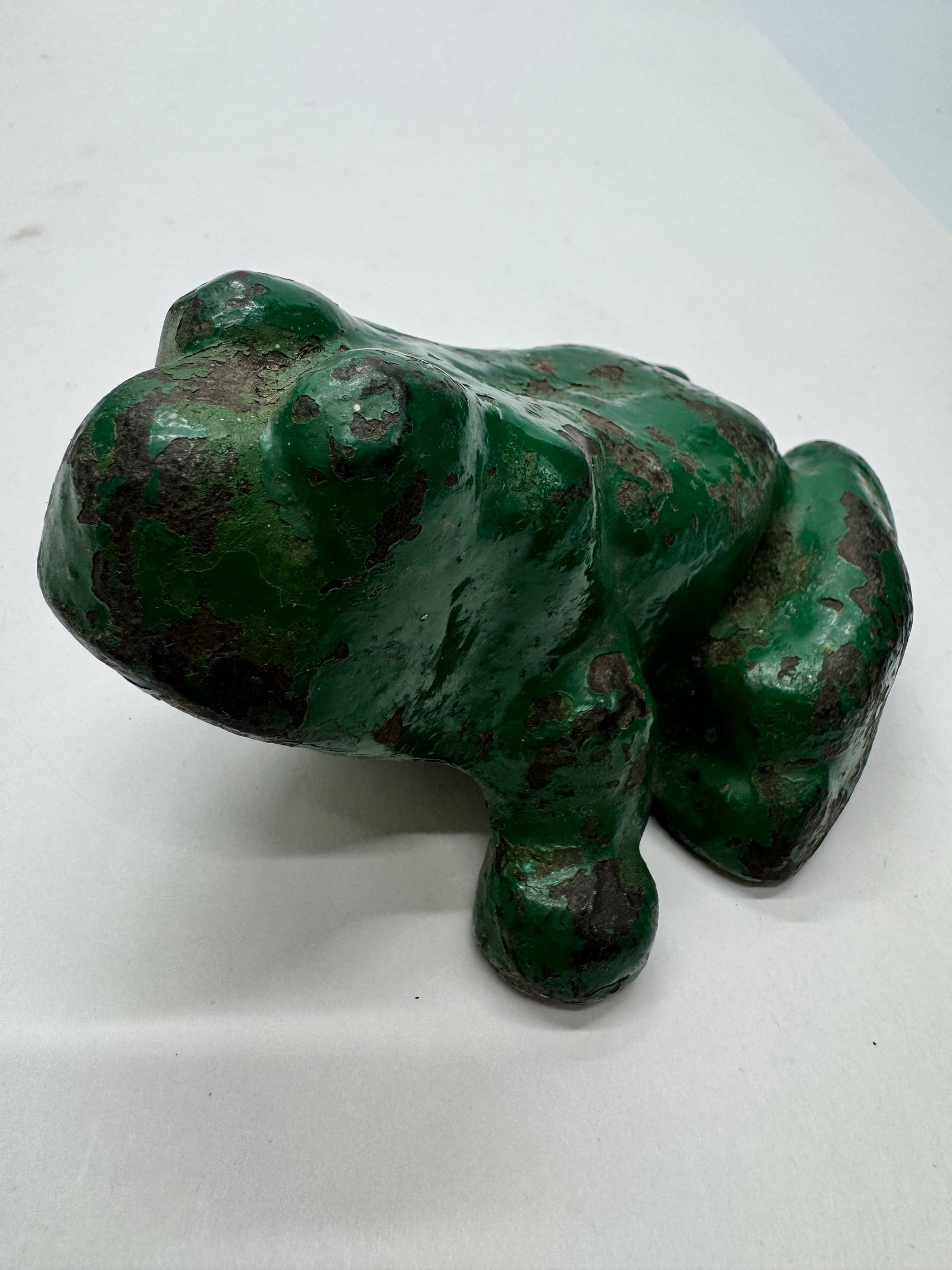 Vintage Cast Iron Green Frog Doorstop Garden Ornament: Vintage cast iron frog figure with green painted finish. Heavy solid casting with age-related paint loss and patina. Suitable as a decorative doorstop, garden ornament, or folk art display piece.