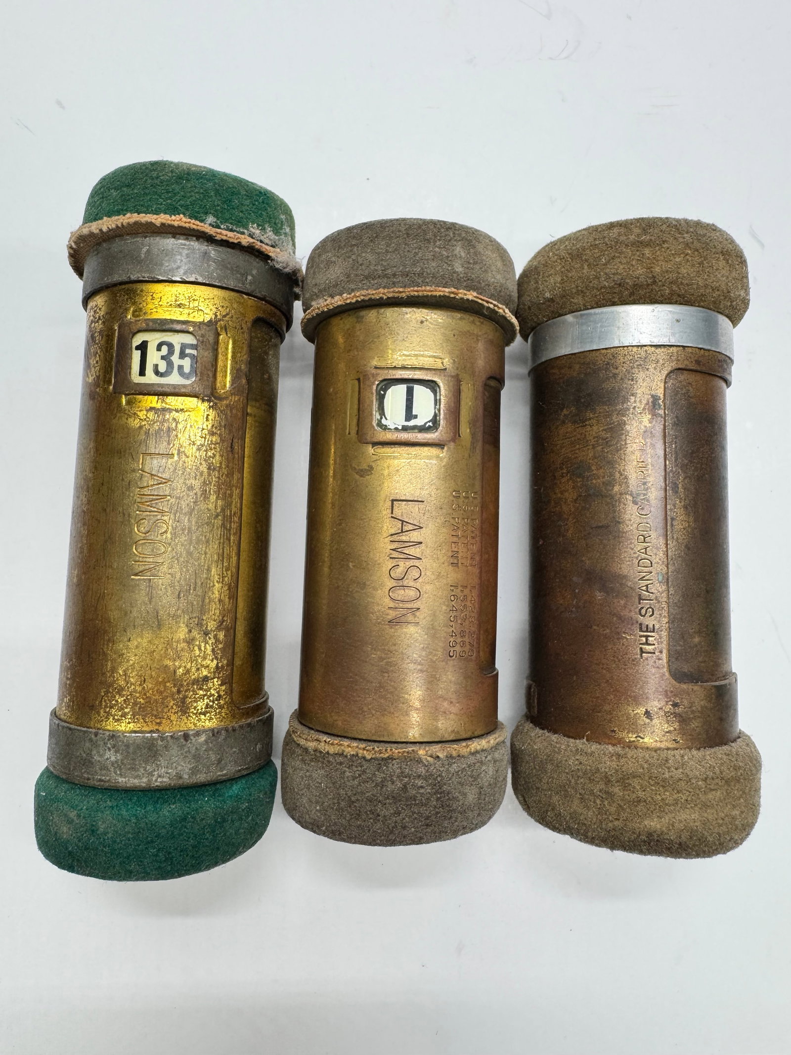 Vintage Lamson Industrial Recorder Chart Roll Cartridges (3): Lot of three vintage Lamson brass industrial recorder/chart roll cartridges with felt end caps. Patent marked with U.S. patent numbers 1,428,279; 1,553,869; and 1,645,495. Used with industrial monitor