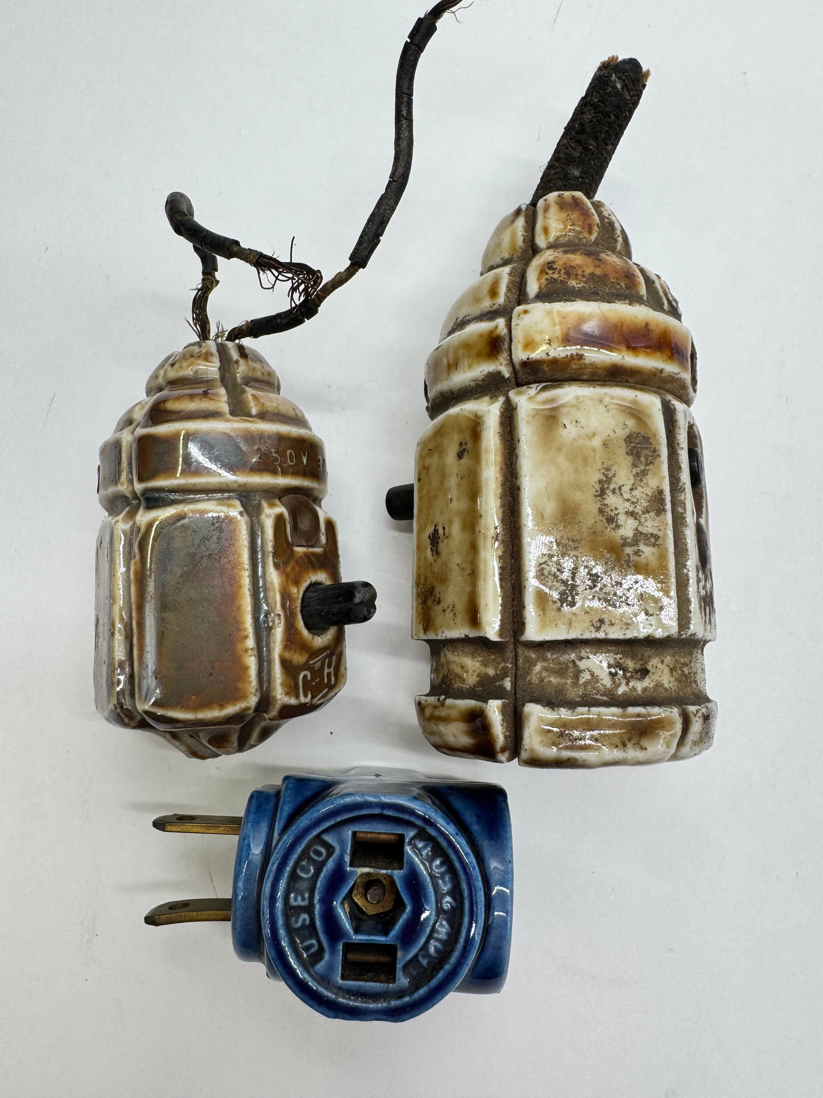 Lot of 3 Vintage Porcelain Electrical Switches & USECO Connector: Lot of three vintage porcelain electrical components including a porcelain rotary switch, large industrial porcelain fuse holder/disconnect, and a blue U.S. Electrical Motors (USECO) porcelain connect