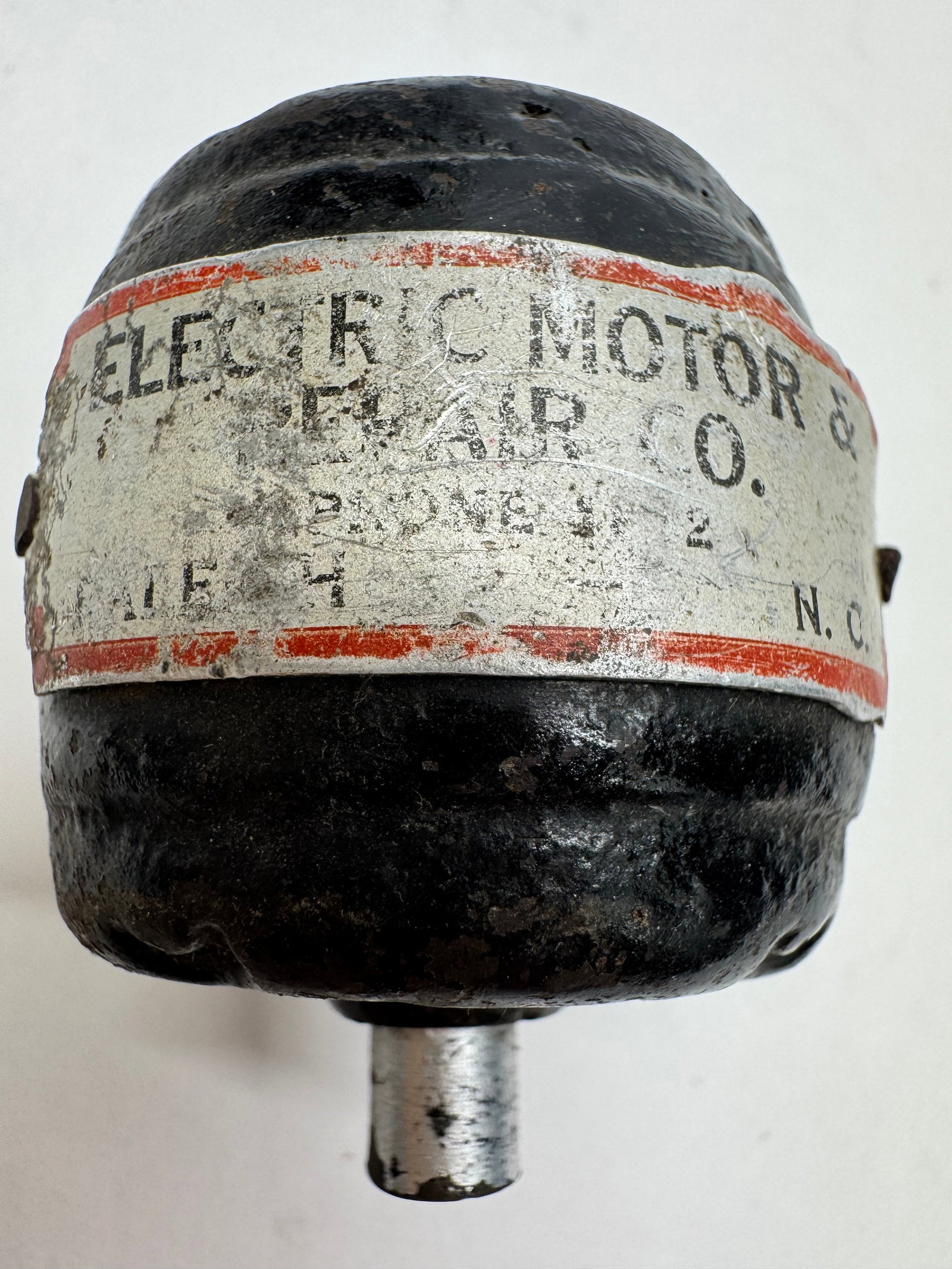 Vintage Electric Motor & Repair Co. Motor Paperweight: Vintage cast metal miniature electric motor paperweight advertising Electric Motor & Repair Co., Charlotte, N.C. Features the original black painted finish, paper label, and rotating shaft. Displays a