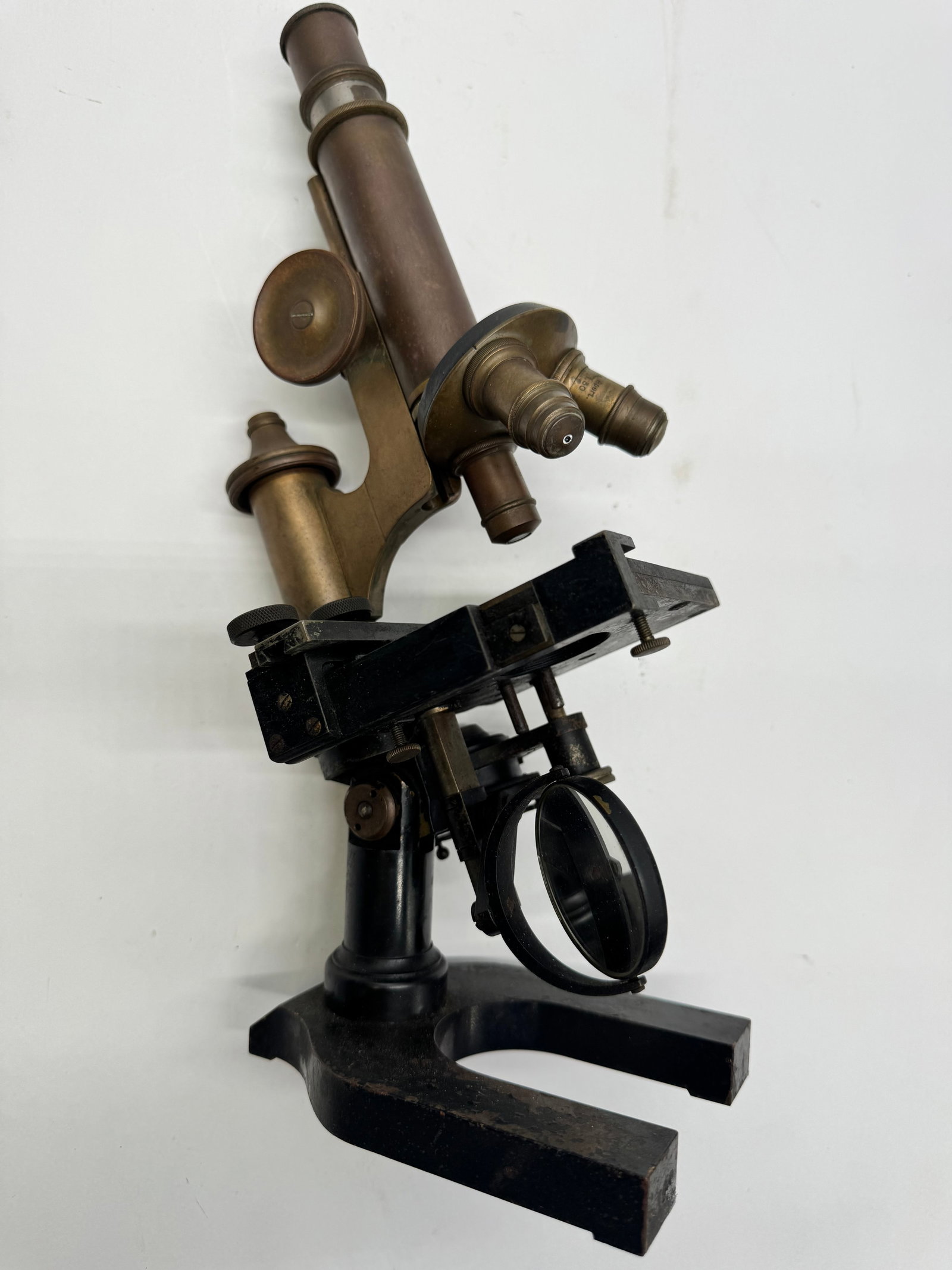 Vintage Spindler & Hoyer German Compound Microscope: Vintage Spindler & Hoyer compound microscope, made in Germany. Features brass optical tube, rotating objective turret, mechanical stage, mirror illuminator, and black enameled cast-iron base. An attra
