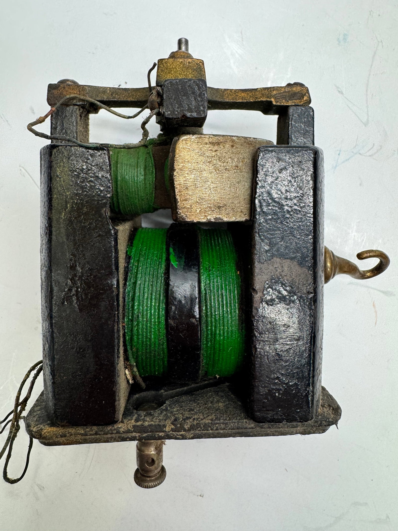 Oddo Bipolar Electric Fan Motor: Original antique Oddo bipolar electric fan motor dating to the early 1900s. Features dual green-wound field coils, a cast iron frame, and exposed armature construction typical of early Oddo electric f