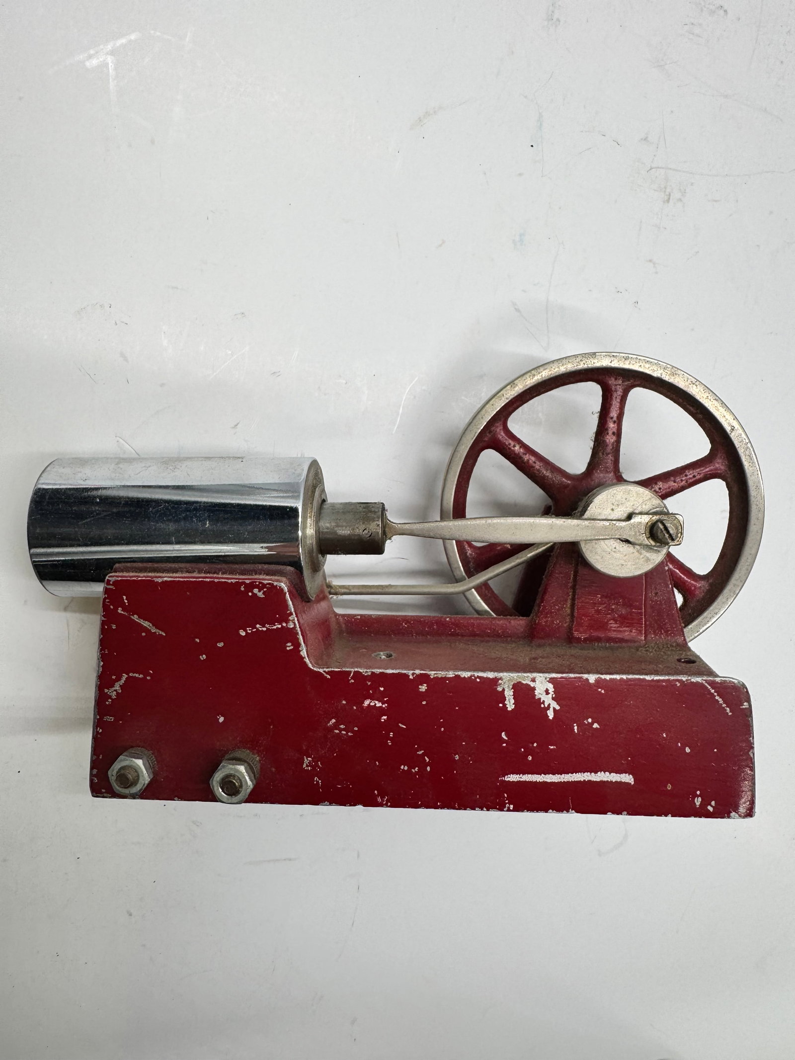Vintage Empire Model B30 Electric Toy Steam Engine: Vintage Empire Model B30 electric toy steam engine manufactured by Metal Ware Corporation, Two Rivers, Wisconsin. Features a red painted cast-iron base, nickel-plated boiler, flywheel, and belt drive.
