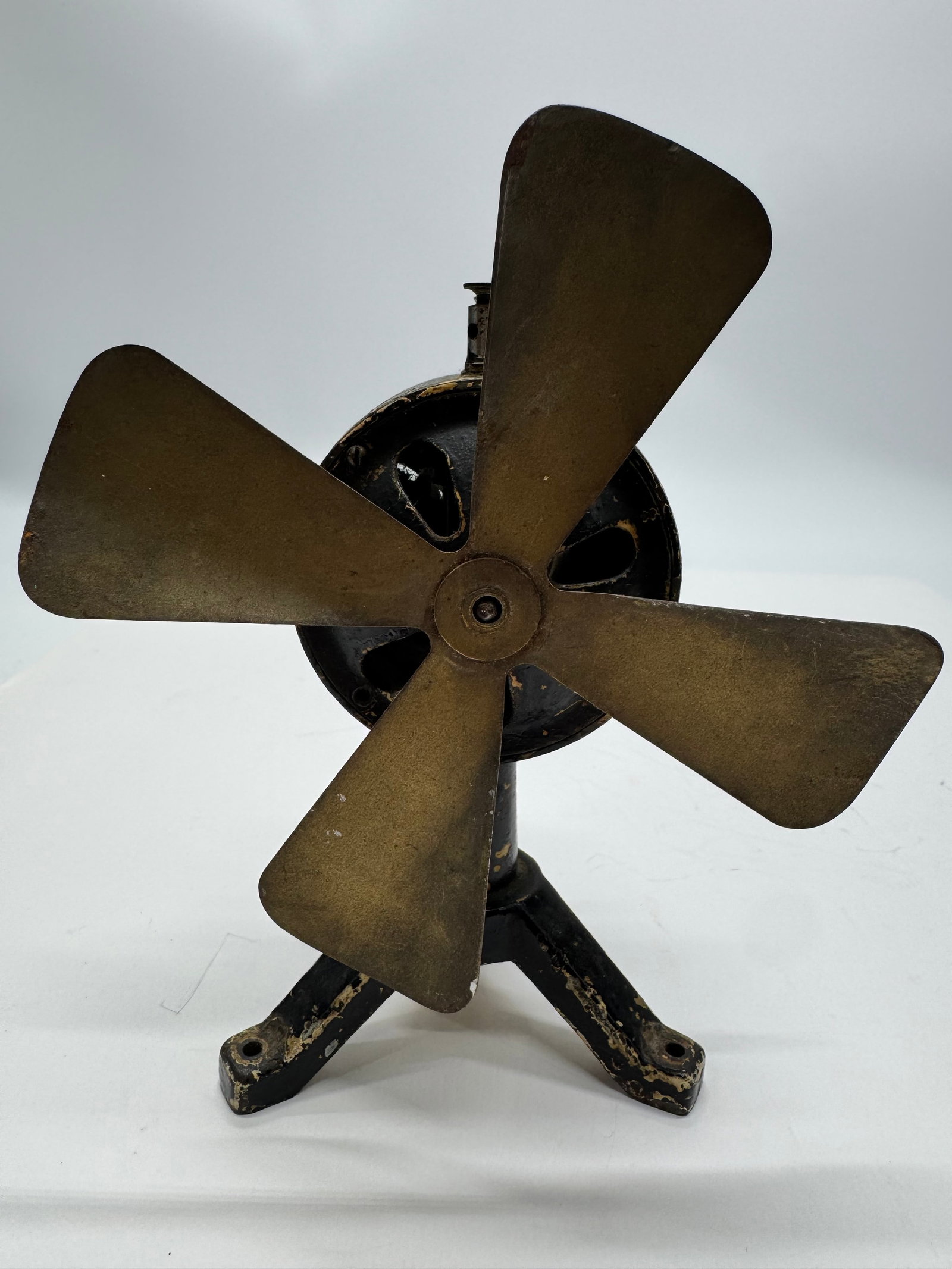 Antique German Tripod Battery Toy Fan: Original antique German tripod battery-operated toy fan dating to the early 1900s. Features a cast iron tripod base, multi-blade metal fan, and compact electric motor typical of early German toy fans.