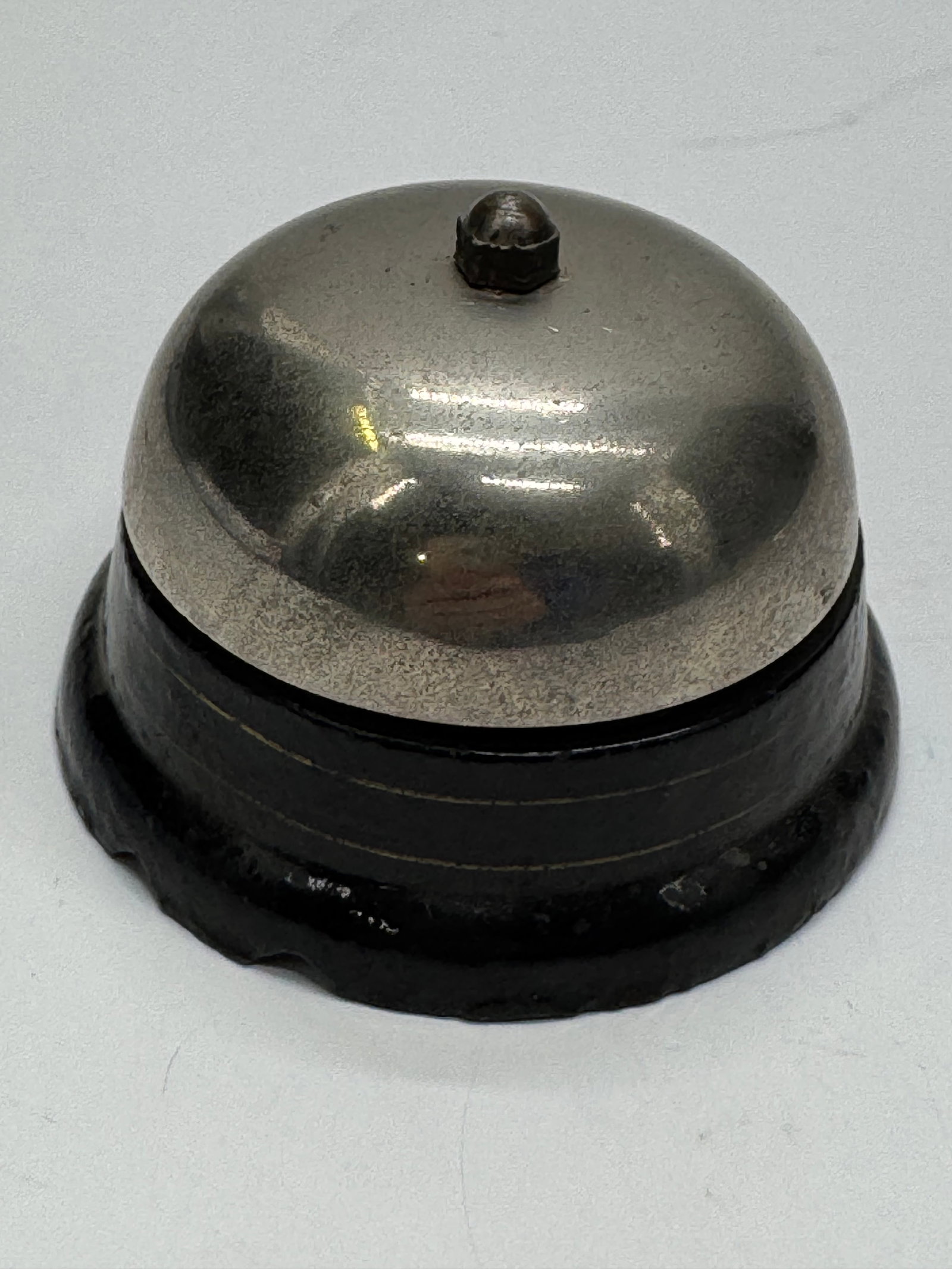 Vintage Counter Service Reception Desk Bell: Vintage countertop service bell featuring a polished chrome-plated steel dome and sturdy black base. Commonly used in hotels, restaurants, retail stores, and reception desks to signal for assistance. 