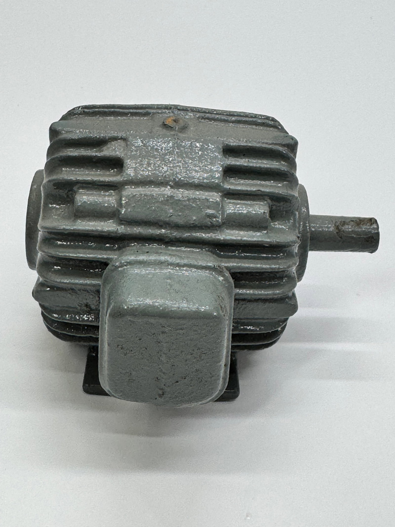 Vintage Cast Iron Industrial Electric Induction Motor: Vintage cast iron industrial electric induction motor featuring a rugged totally enclosed, surface-cooled housing with a keyed output shaft. Designed for continuous-duty industrial applications, this 