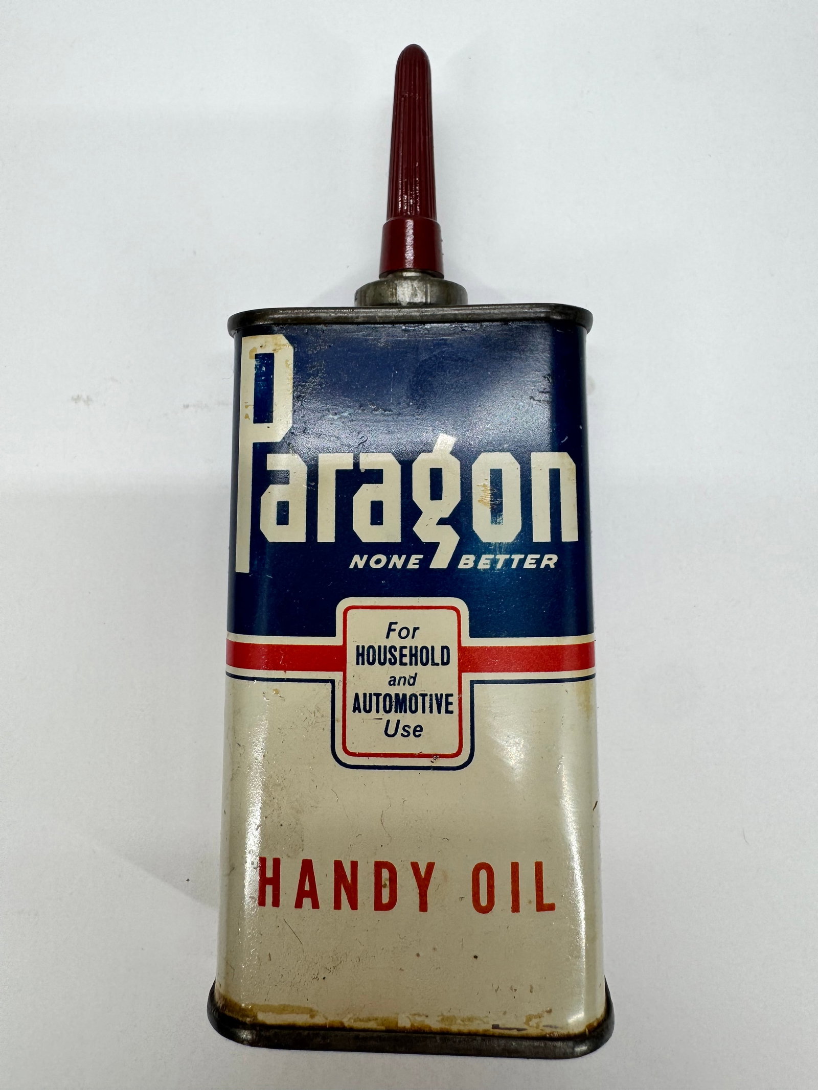 Vintage Paragon Handy Oil Tin Oiler Household & Automotive: Vintage Paragon Handy Oil tin oiler produced by the Paragon Oil Company of New York. Features its original blue, white, and red lithographed graphics with a red metal applicator spout. Intended for bo