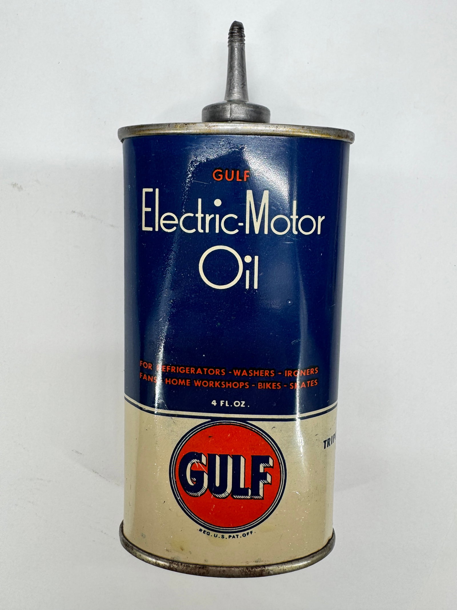 Vintage Gulf Electric Motor Oil 4 Oz Tin Oiler Advertising Can: Vintage Gulf Electric Motor Oil 4-ounce tin oiler featuring the classic blue and beige design with the iconic orange and white Gulf logo. Designed for lubricating electric motors and household applian