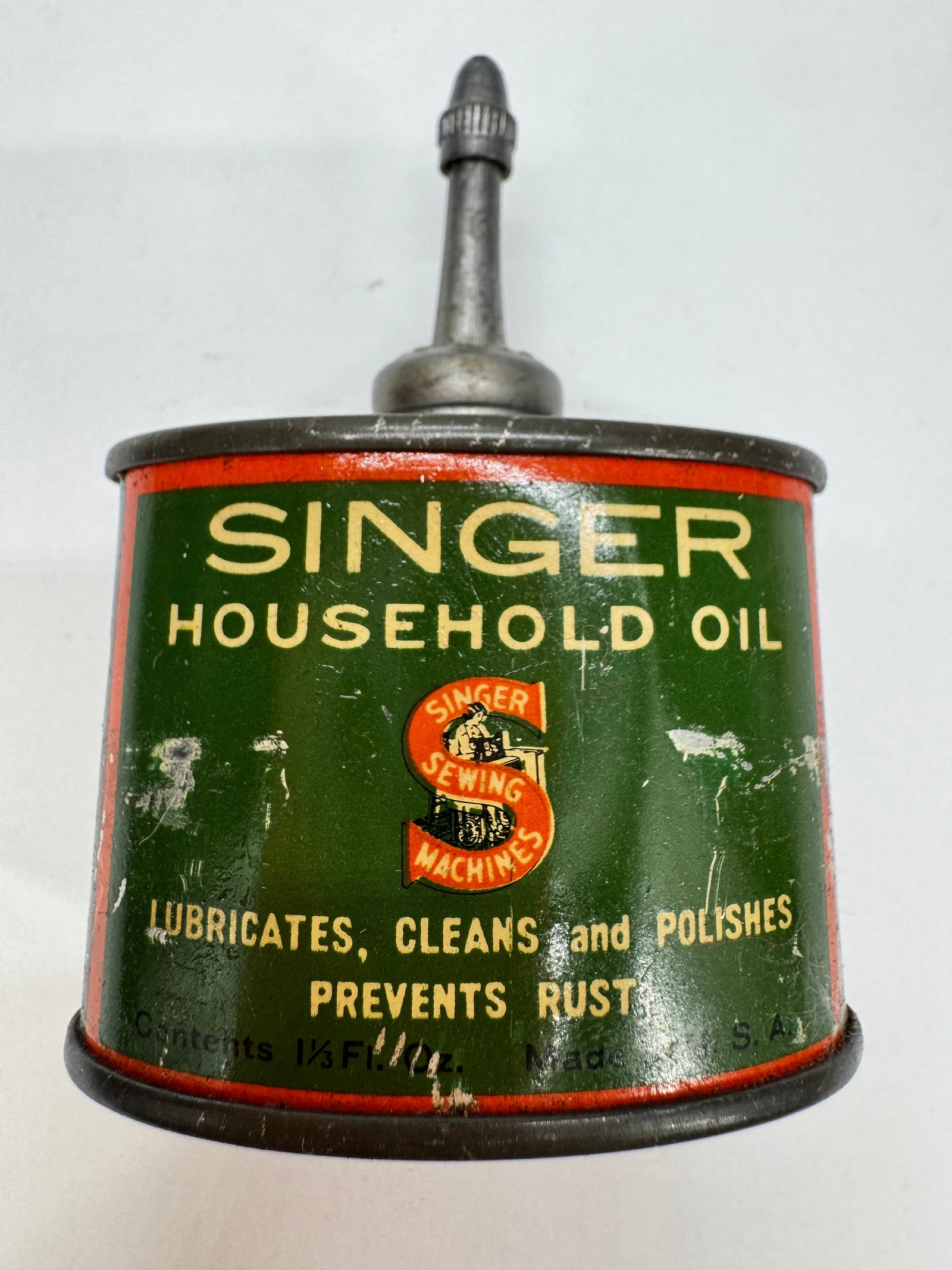 Vintage Singer Household Oil Tin Oiler Lead Top Green Red Can: Vintage Singer Household Oil tin oiler featuring the classic green and red advertising design. Original metal oil can with a screw-off lead top, originally containing approximately 1? or 1½ flu