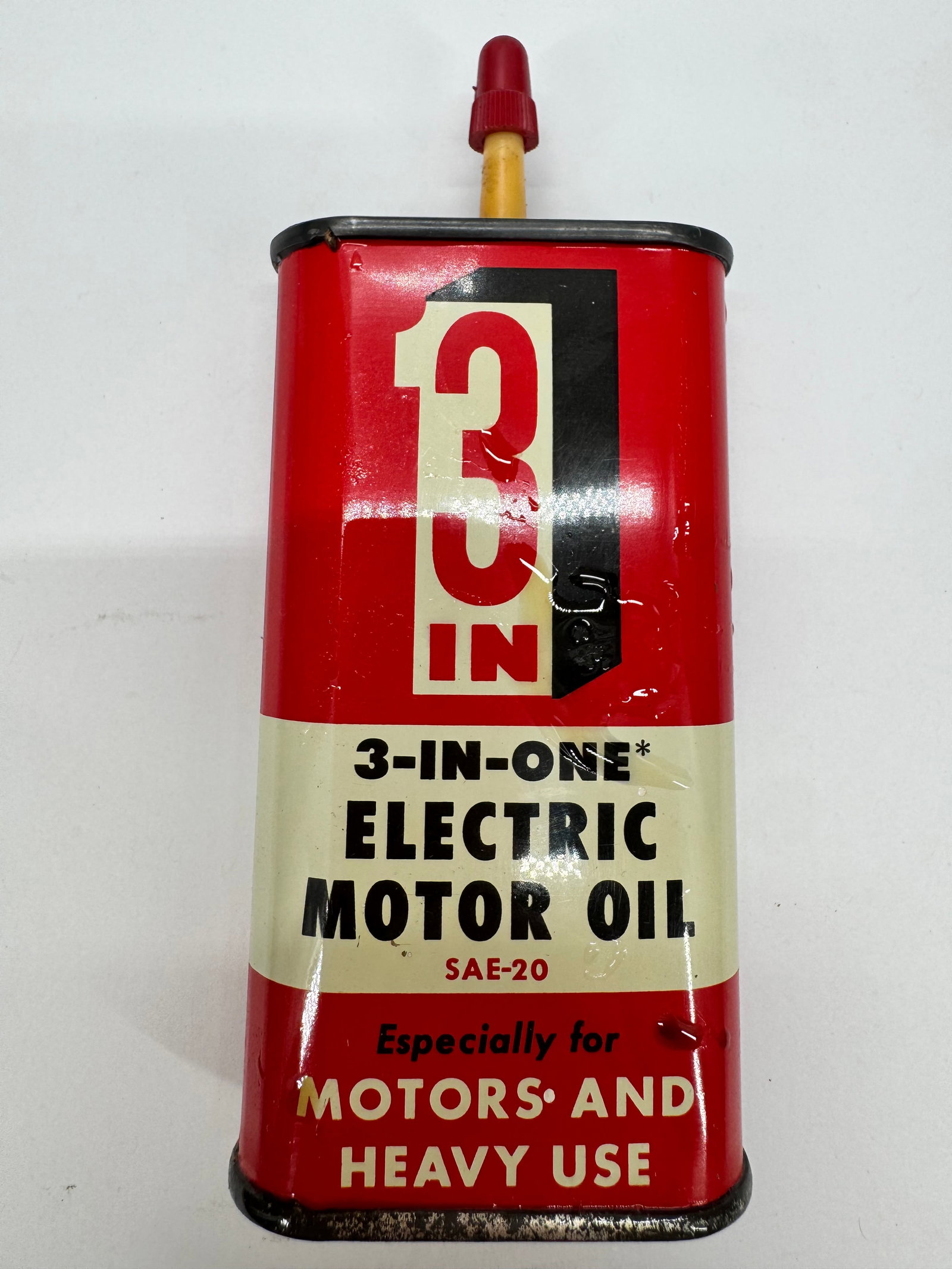 Vintage 3-In-One Electric Motor Oil SAE-20 Tin Oiler: Vintage 3-In-One Electric Motor Oil SAE-20 tin oiler featuring the classic red, cream, and black advertising design with its original red applicator cap. Intended for lubricating electric motors and o