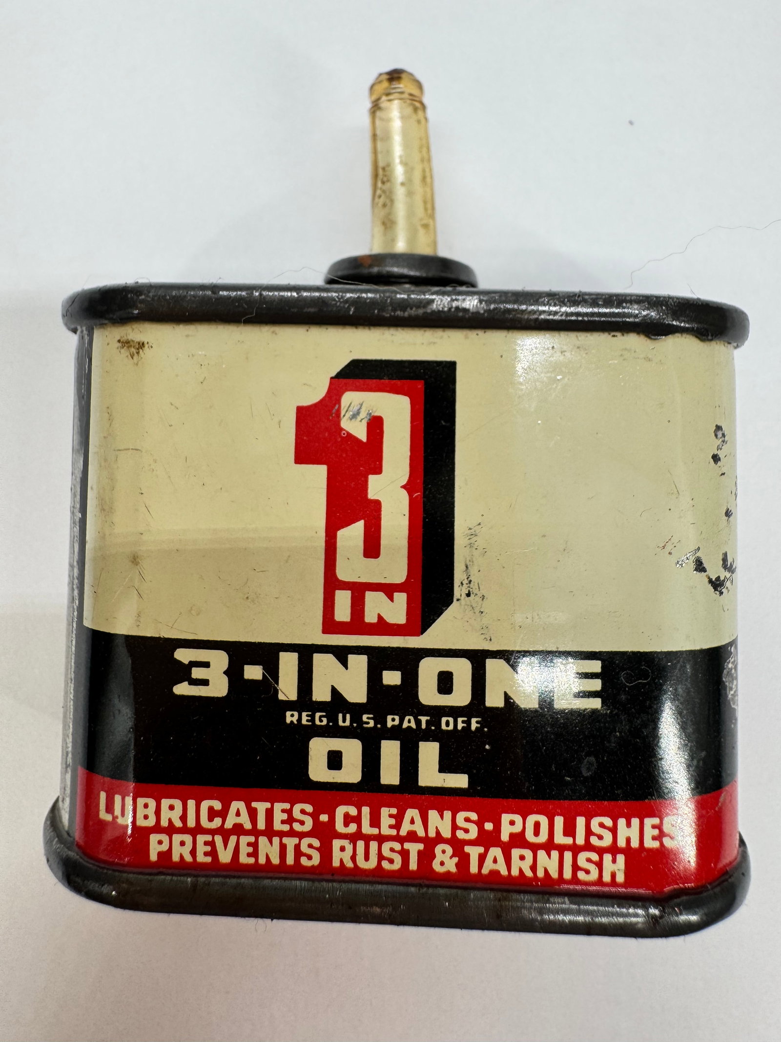 Vintage 3-In-One Oil 1 oz Tin Oiler Boye-Midway USA: Vintage 3-In-One Oil 1 fl. oz. metal tin oiler by Boye-Midway Inc. Features the classic cream, black, and red graphics with its original plastic applicator spout. Designed as a multi-purpose household