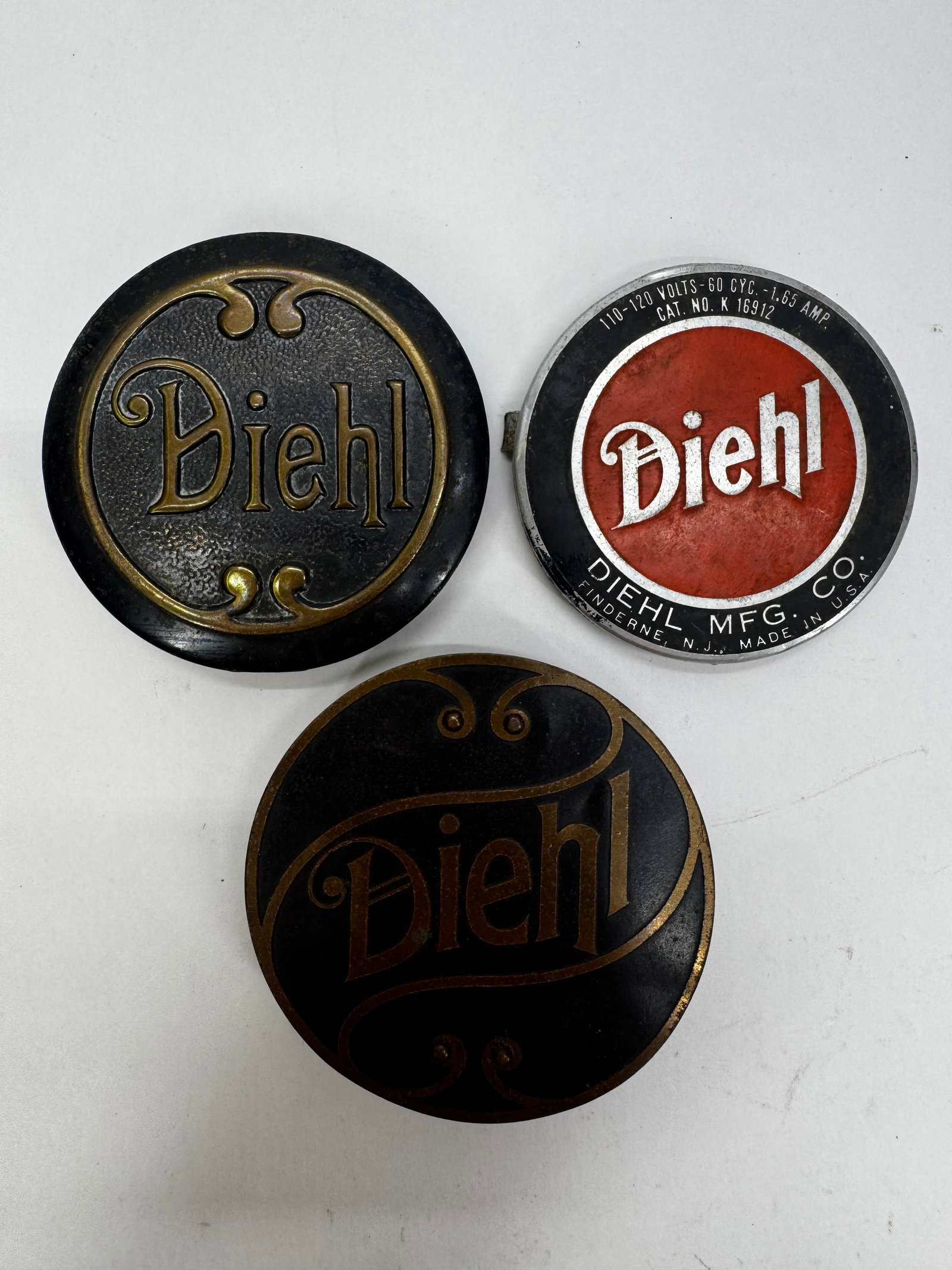 Lot of Vintage Diehl Mfg. Co. Enamel Fan & Motor Nameplate Badges: Lot of vintage Diehl Manufacturing Company enamel nameplate badges from Finderne, New Jersey. These brass and enamel badges were originally used on Diehl electric fans, motors, and other industrial eq