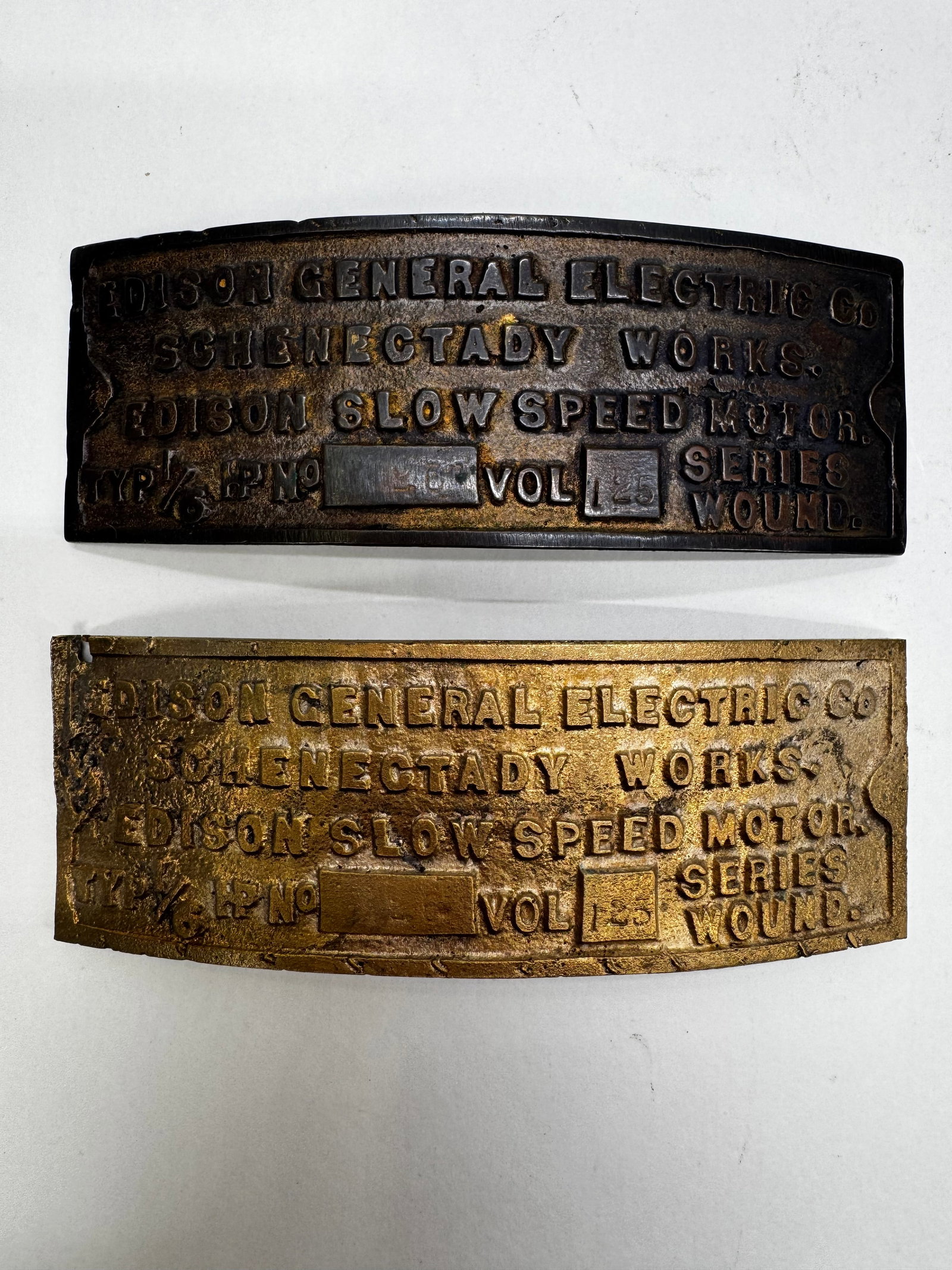 Lot of Edison General Electric Slow Speed Fan Motor Brass Nameplates: Lot of original brass identification nameplates from Edison General Electric slow speed fan motors, dating to the late 1890s and early 1900s. Marked with motor specifications and manufactured in Schen
