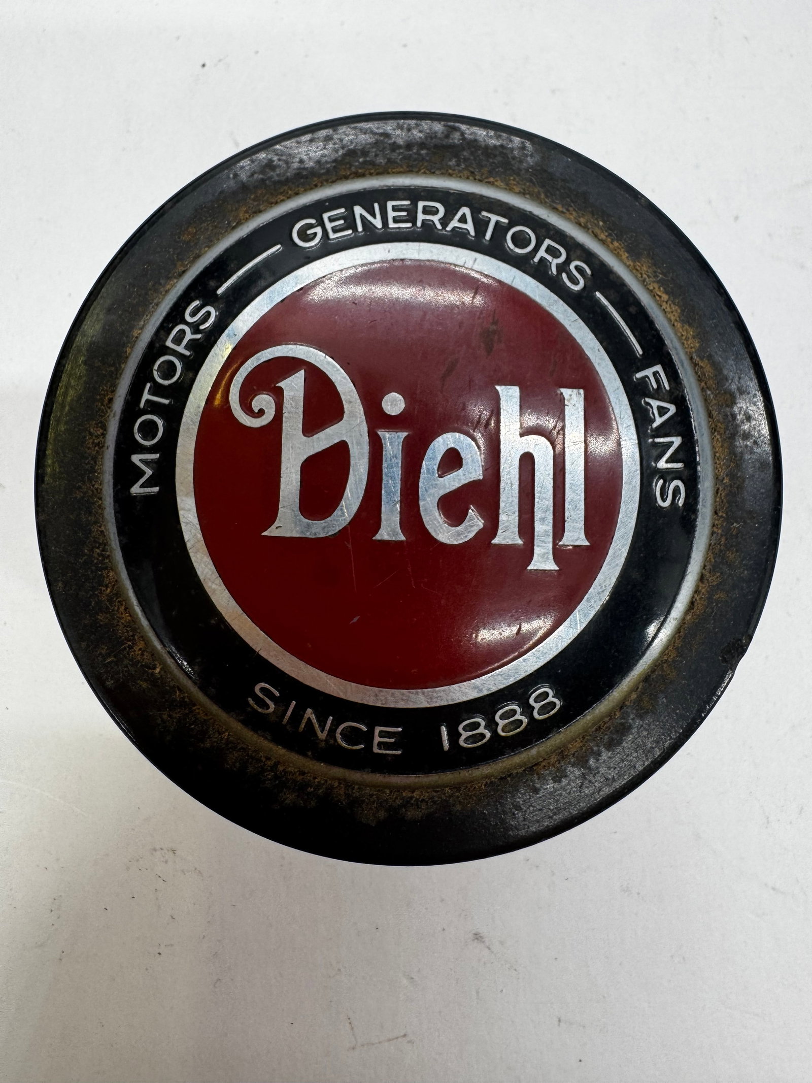 Vintage Diehl Motors Generators Fans Advertising Paperweight Nameplate: Vintage Diehl advertising paperweight or display nameplate featuring the iconic red, white, and black circular design with “Motors,” “Generators,” and “Fans” surrounding the Di